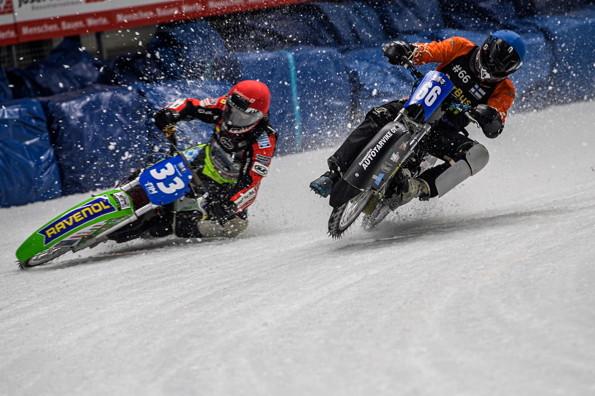 Finland's Aki Ala-Riihimäki (66) (Blue) gets into difficulty as he challenges Germany's Johann Weber (33) (Red) during the FIM Ice Speedway Gladiators World Championship Final 1 at the Max-Aicher-Arena, Inzell on Saturday 23 March 2024. (Photo: Ian Charles | MI News)