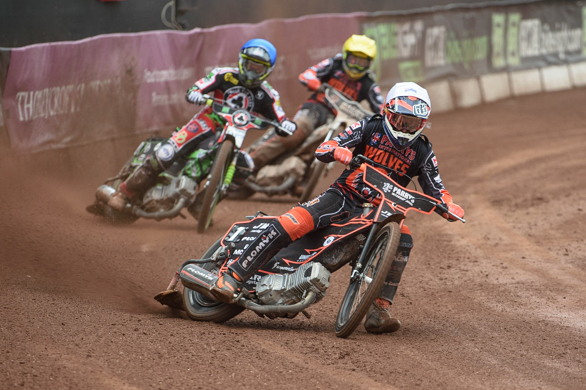 MANCHESTER, UK. AUGUST 30TH Sam Masters  (White) leads Charles Wright  (Blue) and Broc Nicol  (Yellow) during the SGB Premiership match between Belle Vue Aces and Wolverhampton Wolves at the National Speedway Stadium, Manchester on Monday 30th August 2021. (Credit: Ian Charles | MI News)