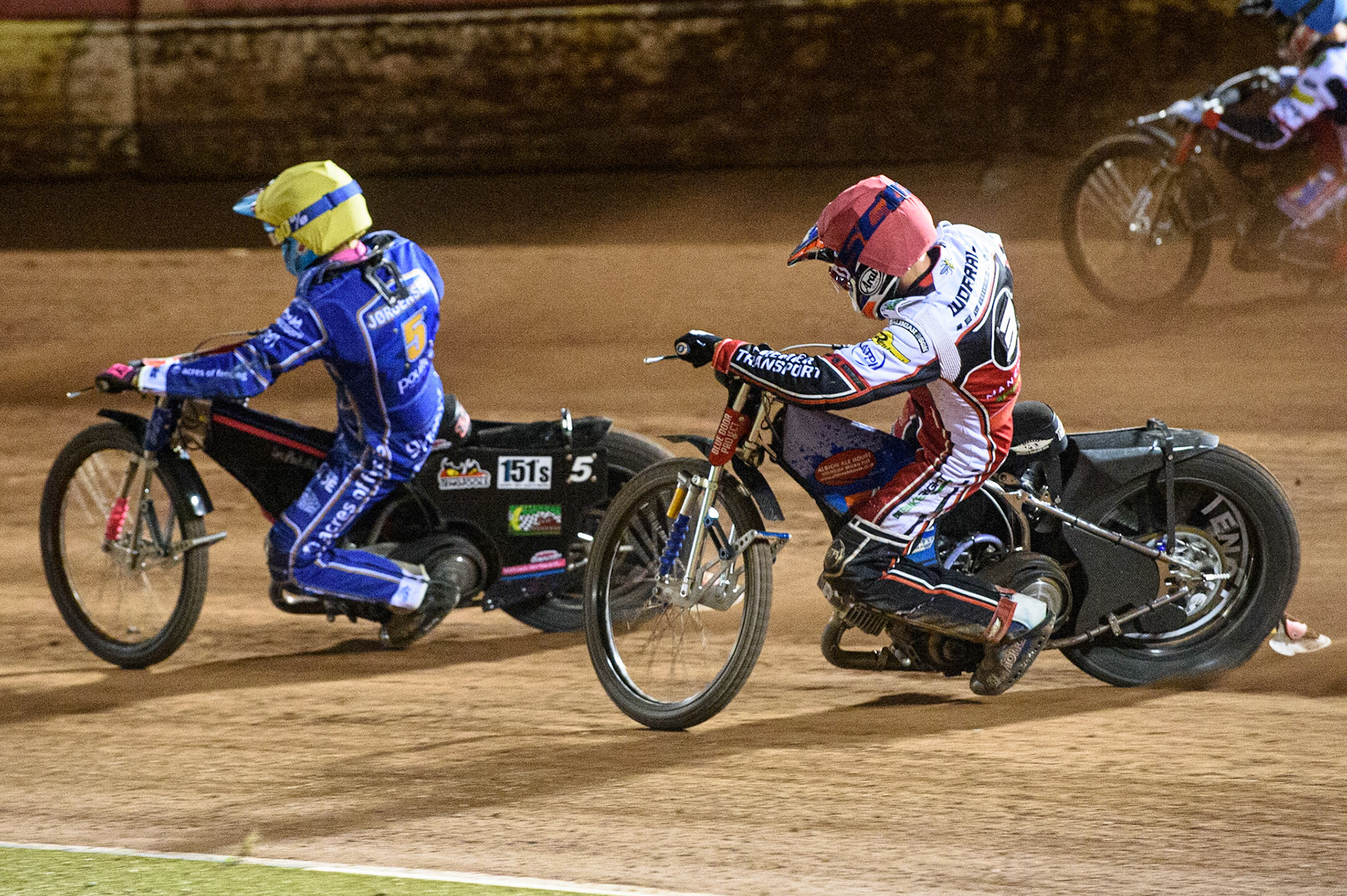 MANCHESTER, UK. SEPT 13TH  Steve Worrall  (Red) chases Thomas Jorgensen   (Yellow) during the SGB Premiership match between Belle Vue Aces and King's Lynn Stars at the National Speedway Stadium, Manchester on Monday 13th September 2021. (Credit: Ian Charles | MI News)