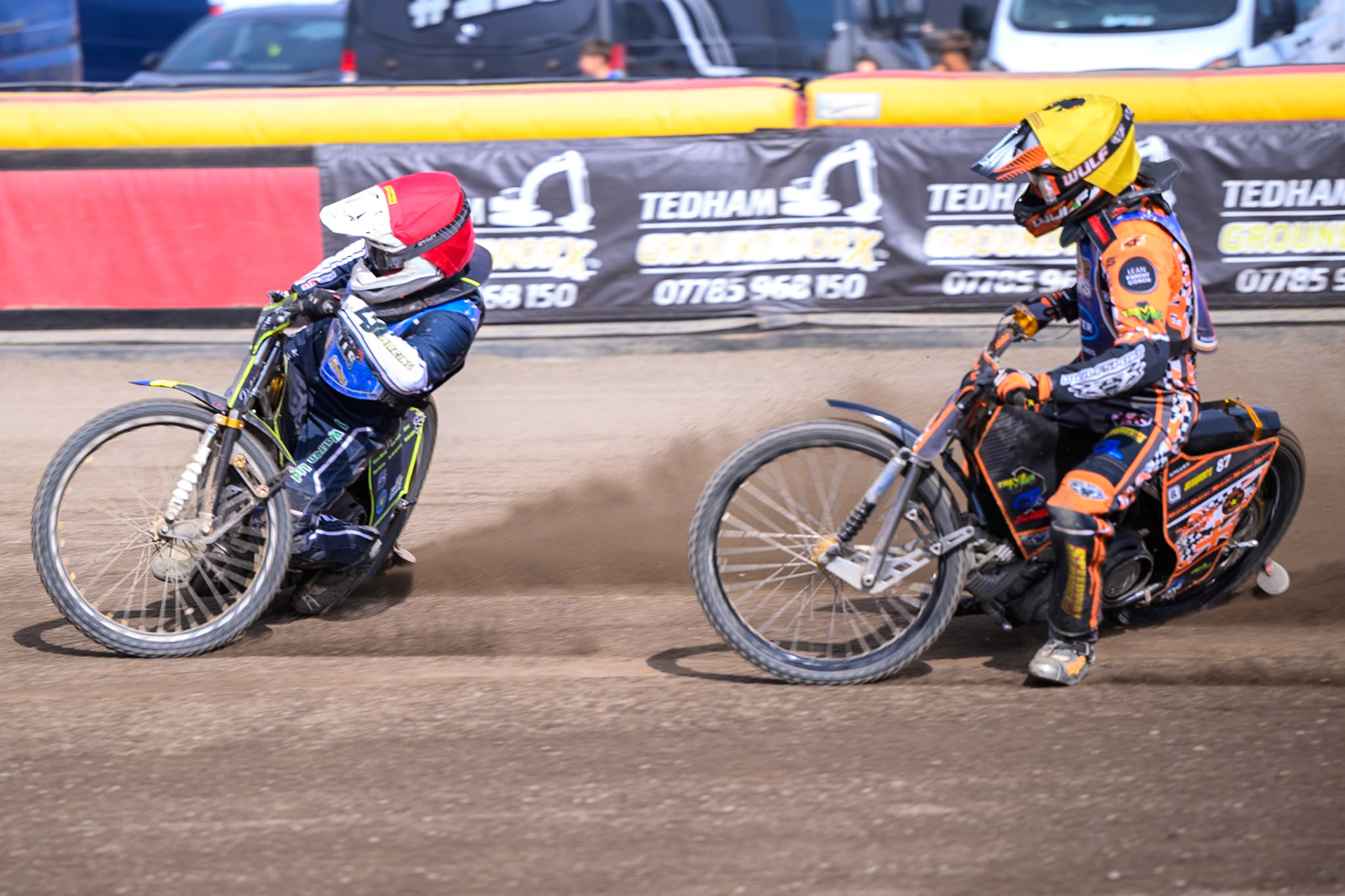 Nathan Ablitt, Guest Rider for Buxton Bulls in Red leading Mickie Simpson of Kings Lynn Young Stars in Yellow during the WSRA National Development League match between Buxton Bulls and King's Lynn Young Stars at Hi-Edge Speedway, Buxton on Sunday 9th August 2026. (Photo: Ian Charles | MI News)