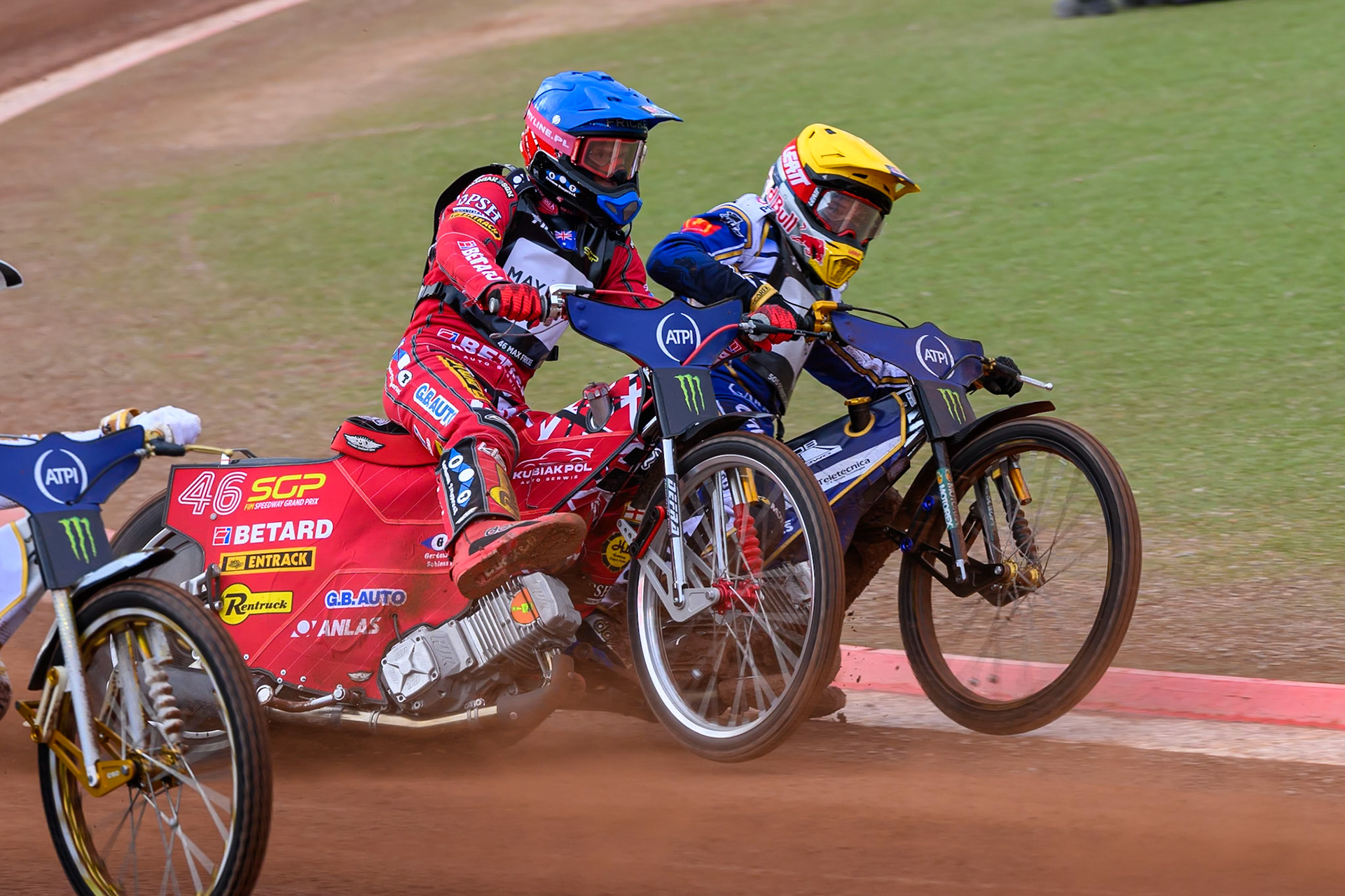 Max Fricke (46) of Australia in Blue rides outside Robert Lambert (505) of Great Britain in Yellow during the ATPI  FIM Speedway GP of Manchester at the National Speedway Stadium, Manchester on Friday 5th June 2026. (Photo: Ian Charles | MI News)
