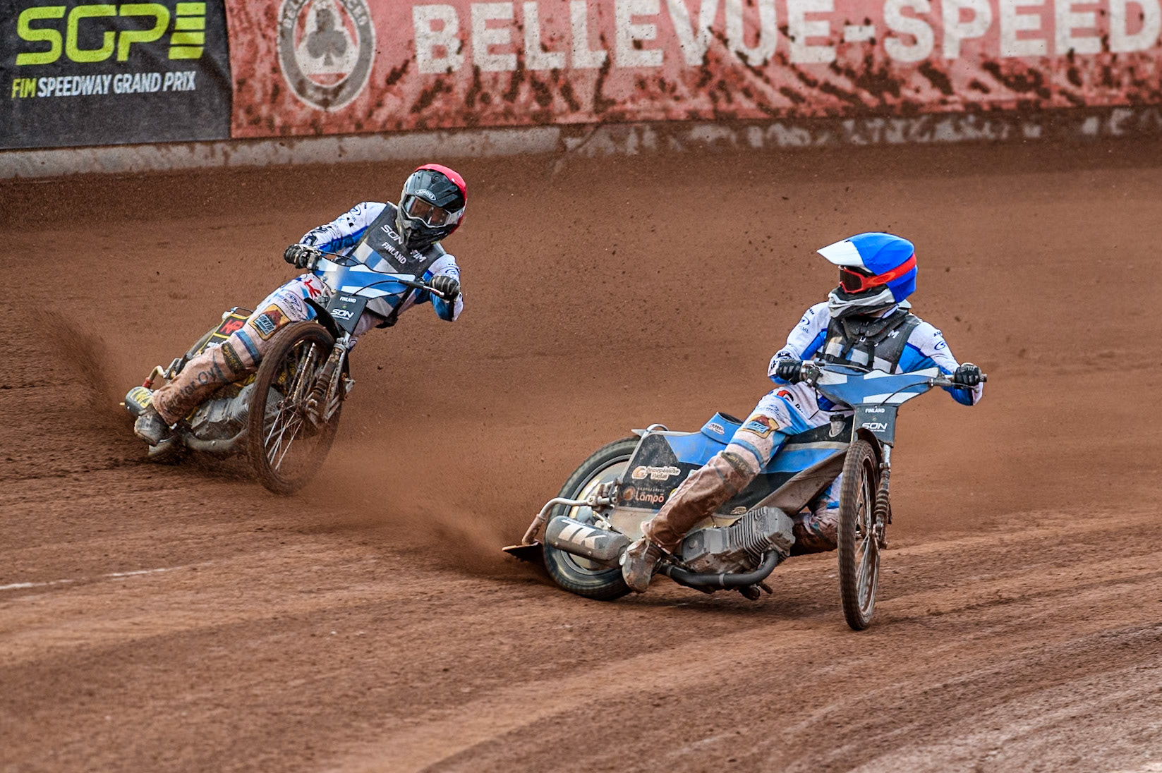 Antti Vuolas of Finland in Blue looks for his team mate Jesse Mustonen of Finland in Red during the Monster Energy FIM Speedway of Nations Semi-Final 1 at the National Speedway Stadium, Manchester on Tuesday 9th July 2024. (Photo: Ian Charles | MI News)