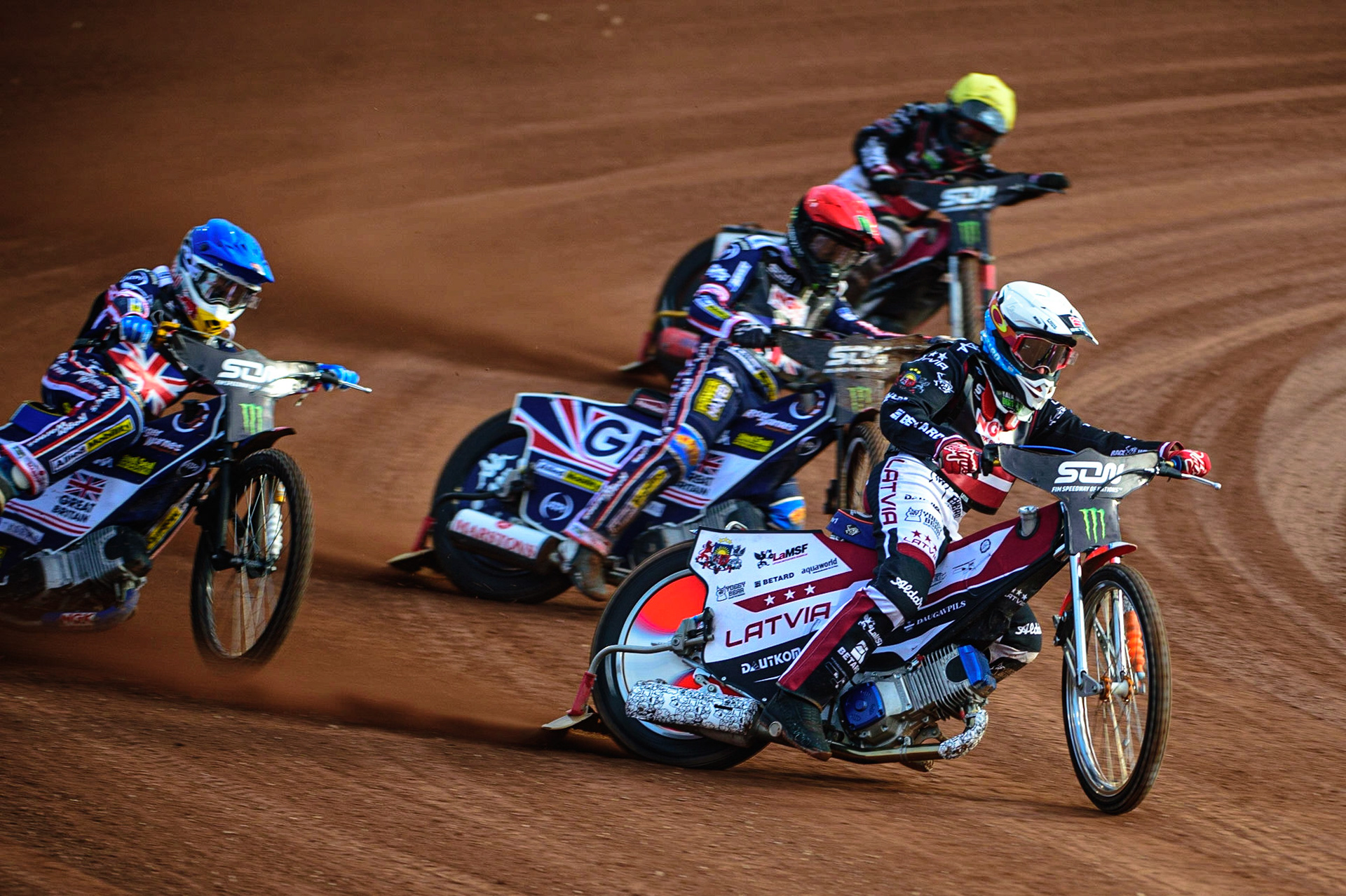 MANCHESTER, UK. OCT 16TH Andzejs Lebedevs of Latvia (White) leads Robert Lambert of Great Britain (Blue), Tai Woffinden of Great Britain (Red) and Olegs Mijailovs of Latvia (Yellow) during the Monster Energy FIM Speedway of Nations at the National Speedway Stadium, Manchester on Saturday  16th October 2021. (Credit: Ian Charles | MI News)