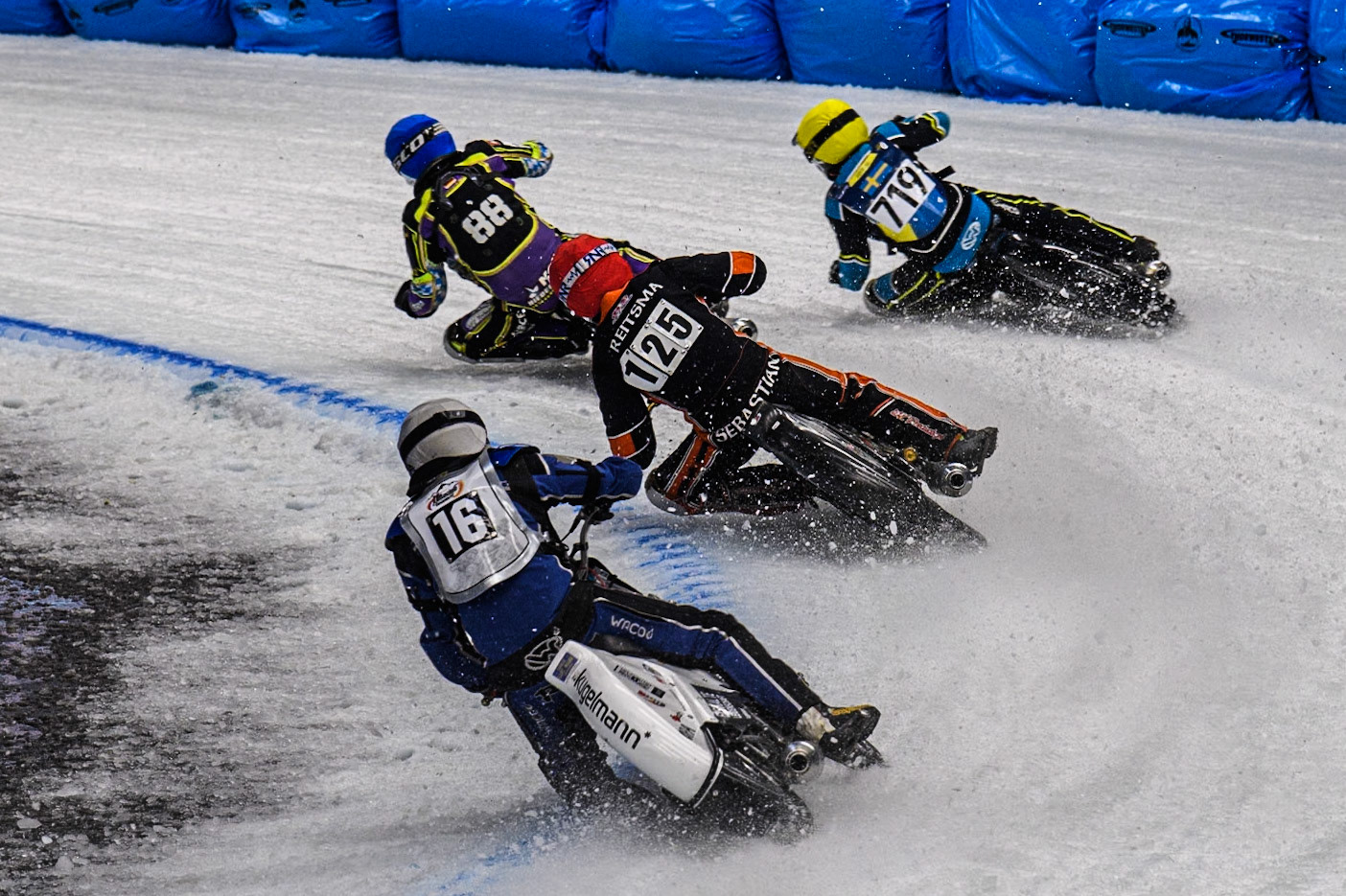 Wild Card Reinhard Greisel (16) of Germany in White chases Sebastian Reitsma (125) of The Netherlands in Red, Filip Jäger (719) of Sweden in Yellow and Max Niedermaier  (88) of Germany in Blueduring the Ice Speedway Gladiators World Championship Final 2 at Max-Aicher-Arena, Inzell on Sunday 16th March 2025. (Photo: Ian Charles | MI News)
