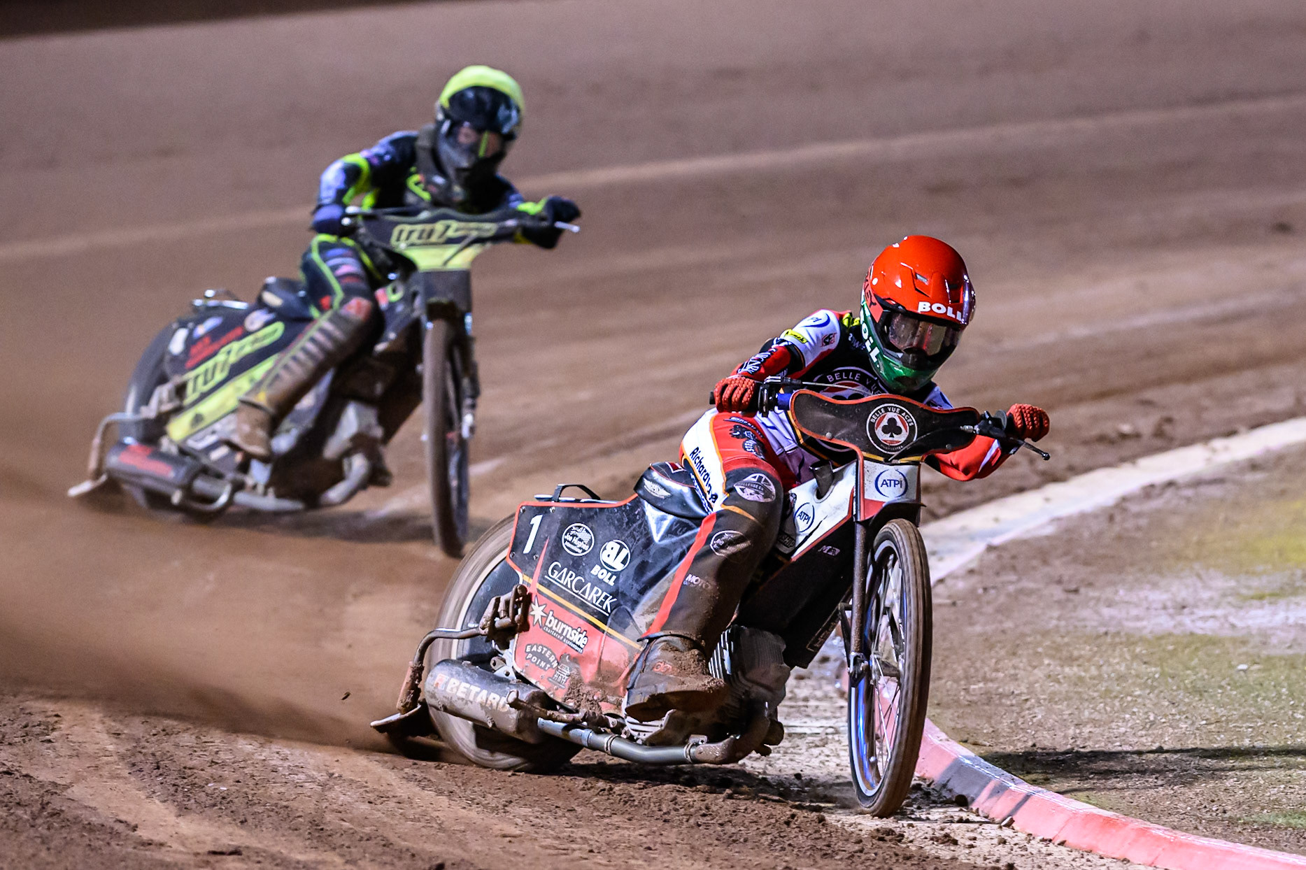 Brady Kurtz of Belle Vue Aces in Red leading Dan Thompson of Ipswich Witches  in Yellow during the Rowe Motor Oil Premiership Play Off Semi Final 1 (1st Leg)  between Belle Vue Aces and Ipswich Witches at the National Speedway Stadium, Manchester on Monday 8th September 2025. (Photo: Ian Charles | MI News)