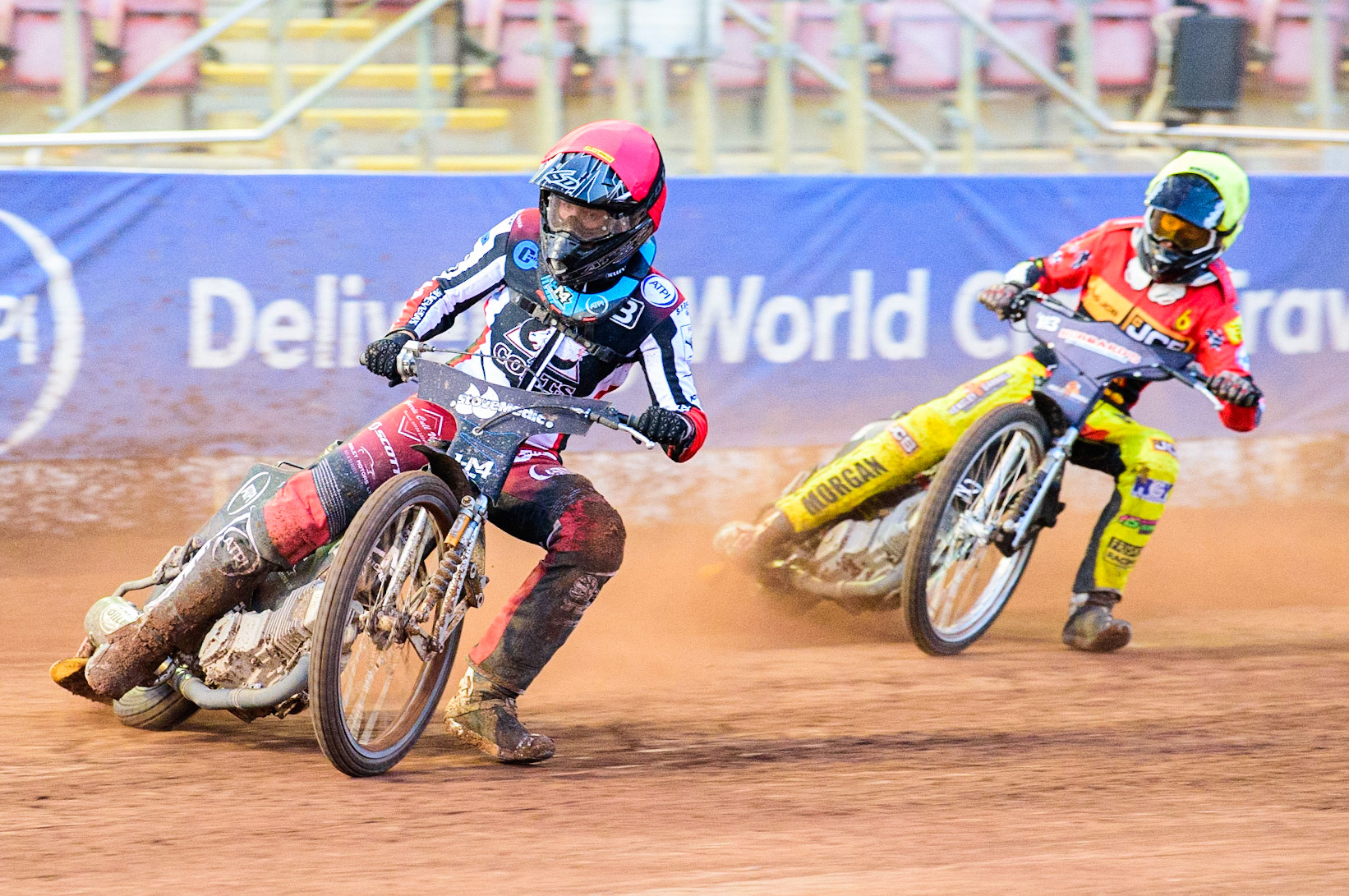 Harry McGurk  (Red) leads Vinnie Foord  (Yellow) during the National Development League match between Belle Vue Aces and Leicester Lions at the National Speedway Stadium, Manchester on Friday 19th August 2022. (Credit: Ian Charles | MI News)