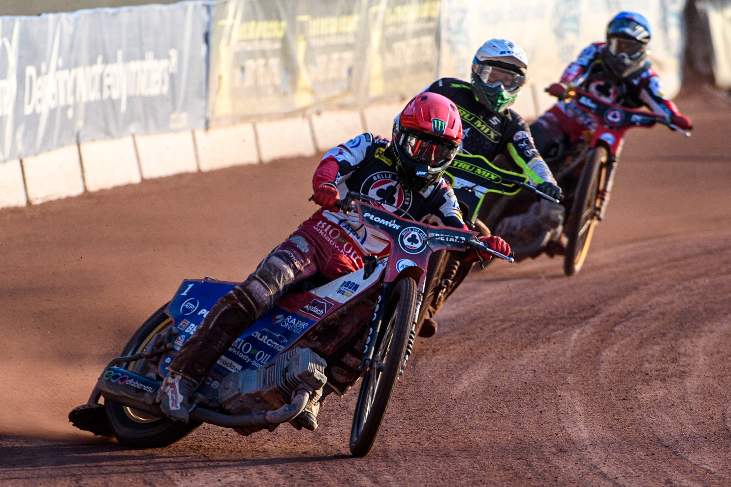 Dan Bewley (Red) leads Jason Doyle (White) and Norick Blodorn (Blue) during the Sports Insure Premiership match between Belle Vue Aces and Ipswich Witches at the National Speedway Stadium, Manchester on Monday 17th July 2023. (Photo: Ian Charles | MI News)