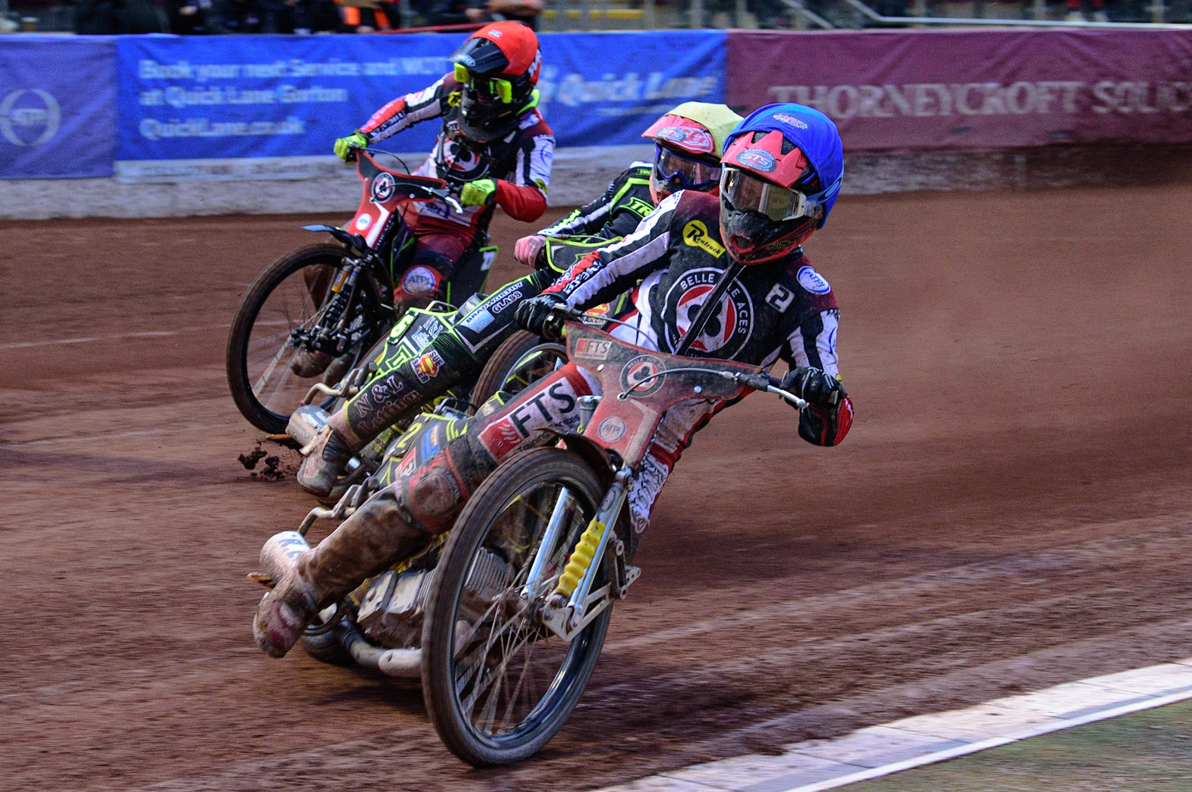 MANCHESTER, UK. JUN 6TH  Jye Etheridge (Blue)  leads Ben Barker  (Yellow) and Tom Brennan  (Red) during the SGB Premiership match between Belle Vue Aces and Ipswich Witches at the National Speedway Stadium, Manchester on Monday 6th June 2022. (Credit: Ian Charles | MI News)