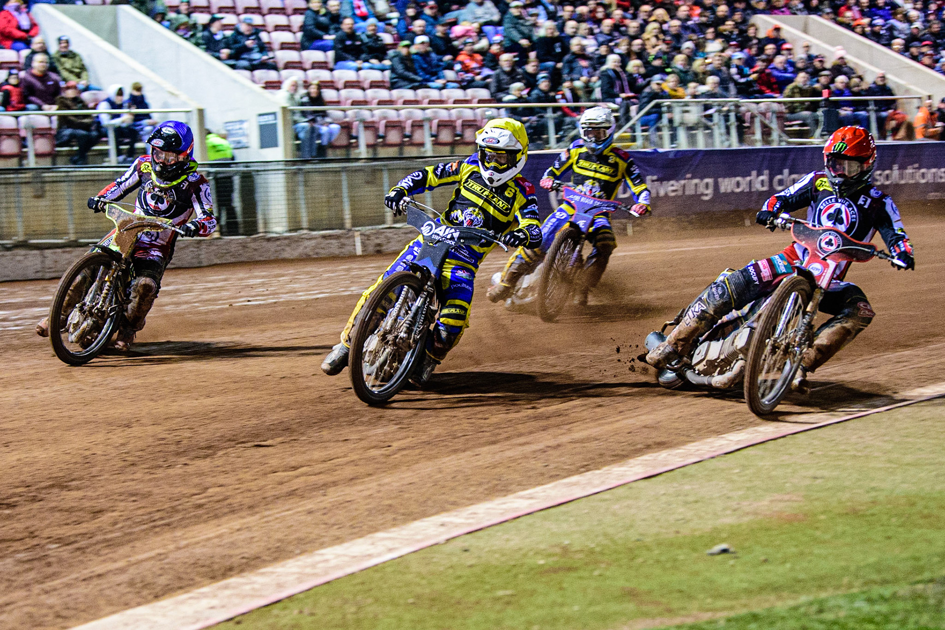 Lewis Kerr  (Yellow) leads Jaimon Lidsey  (Red) Tom Brennan  (Blue) with Adam Ellis  (White) behind during the SGB Premiership match between Belle Vue Aces and Sheffield Tigers at the National Speedway Stadium, Manchester on Monday 27th March 2023. (Photo: Ian Charles | MI News)
