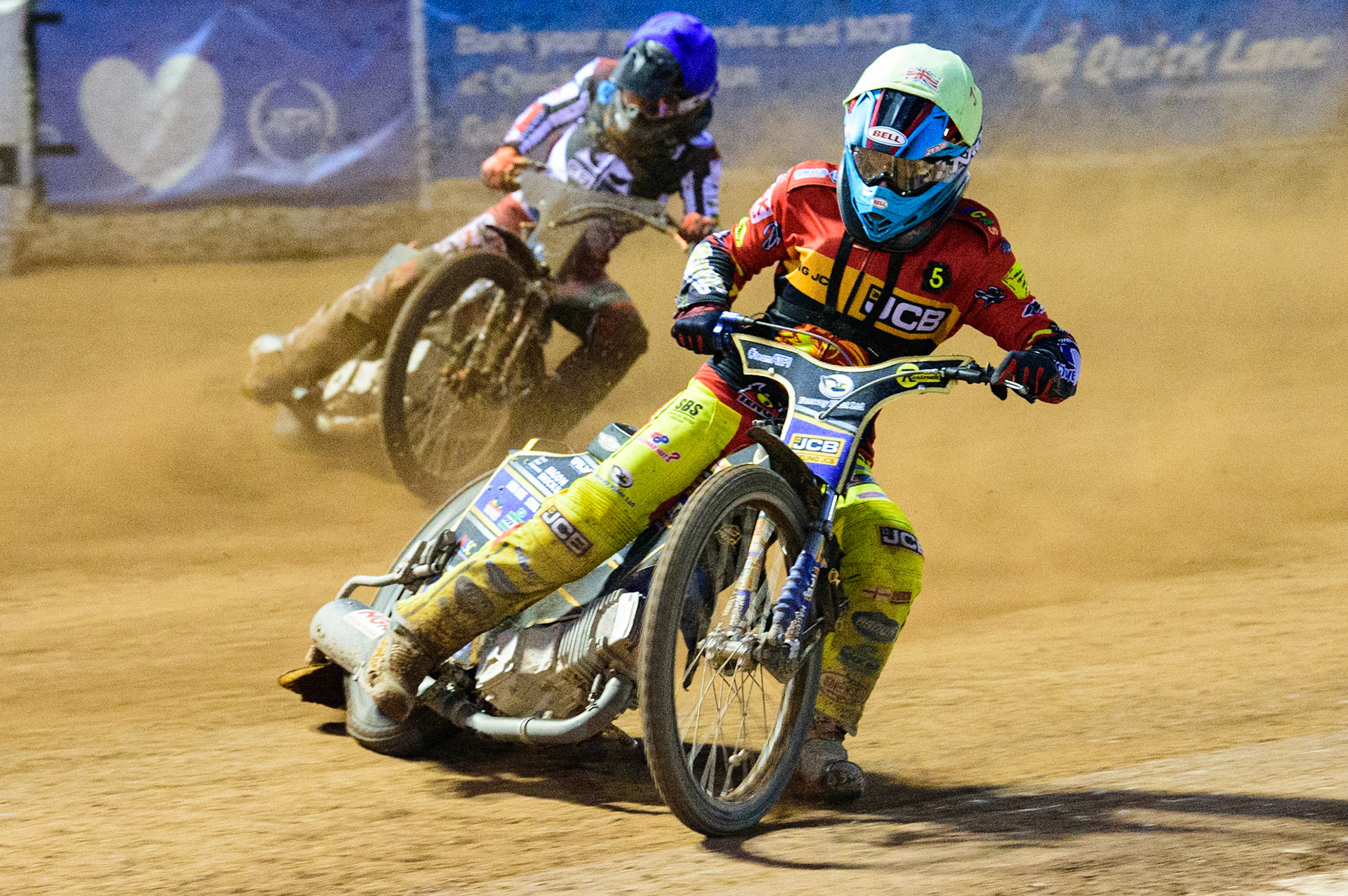 Joe Thompson   (Yellow) leads Jack Smith  (Blue) during the National Development League match between Belle Vue Aces and Leicester Lions at the National Speedway Stadium, Manchester on Friday 19th August 2022. (Credit: Ian Charles | MI News)