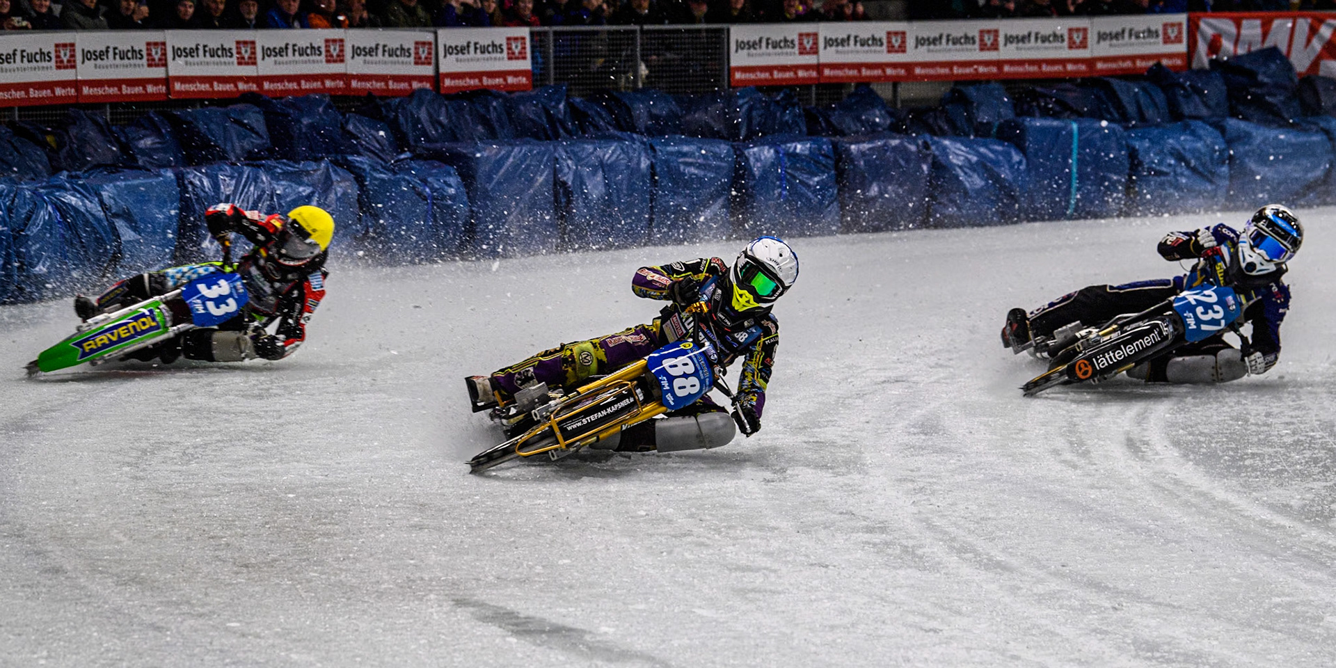 Germany's Max Niedermaier (88) (Blue) leads  Germany's Johann Weber (33)(Yellow) and Sweden's Jimmy Hörnell Lidfalk (237) (White) during the FIM Ice Speedway Gladiators World Championship Final 1 at the Max-Aicher-Arena, Inzell on Saturday 23 March 2024. (Photo: Ian Charles | MI News)