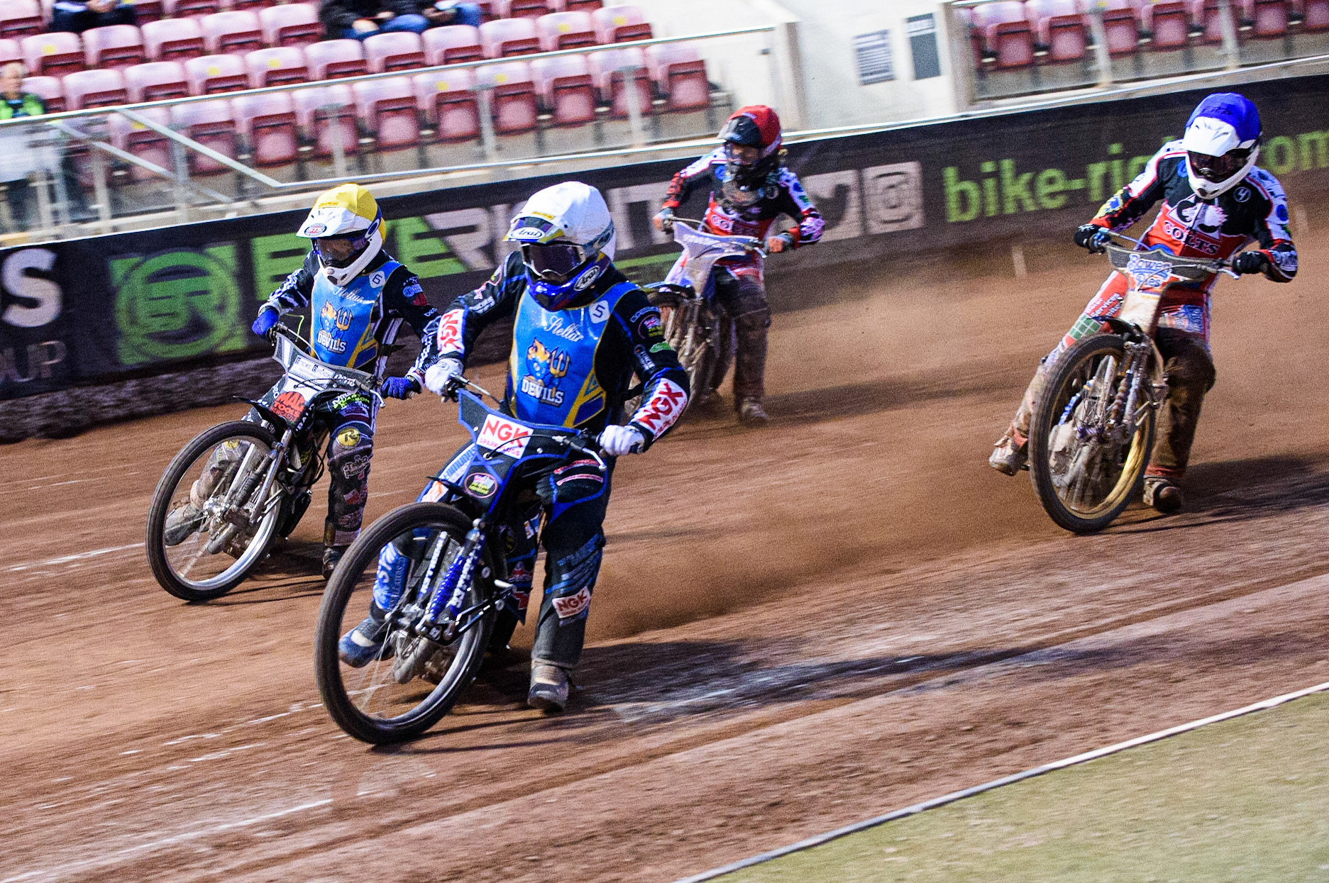 MANCHESTER, UK. AUGUST 20TH  Tom Woolley  (White) and Archie Freeman  (Yellow) lead Paul Bowen  (Blue) and Harry McGurk  (Red) during the National Development League match between Belle Vue Aces and Armadale Devils at the National Speedway Stadium, Manchester on Friday 20th August 2021. (Credit: Ian Charles | MI News)