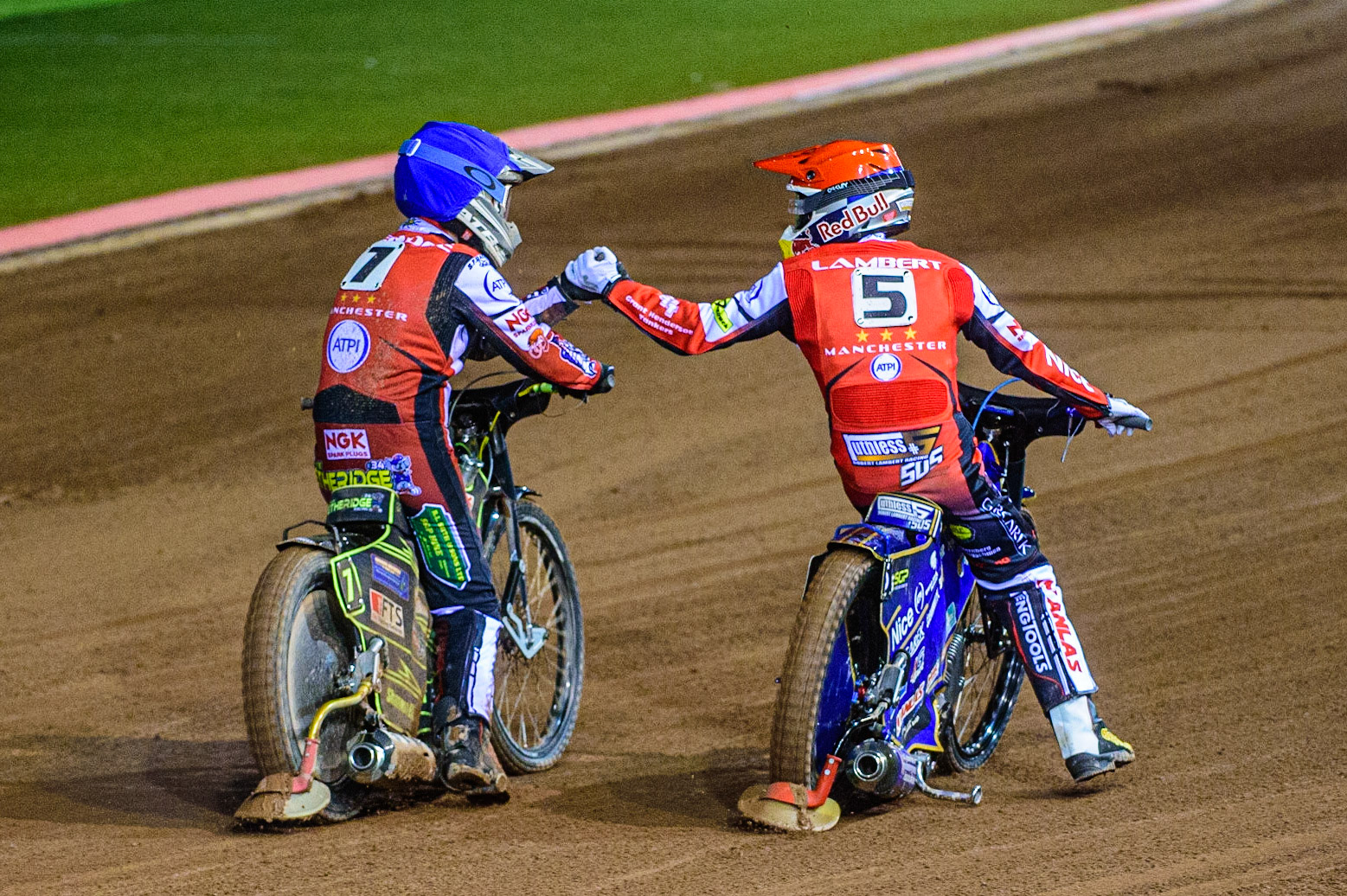 Robert Lambert (Red) and Jye Etheridge  (Blue) celebrate their maximum heat win during the SGB Premiership Semi Final 2nd Leg between Belle Vue Aces and Ipswich Witches at the National Speedway Stadium, Manchester on Monday 3rd October 2022. (Credit: Ian Charles | MI News)