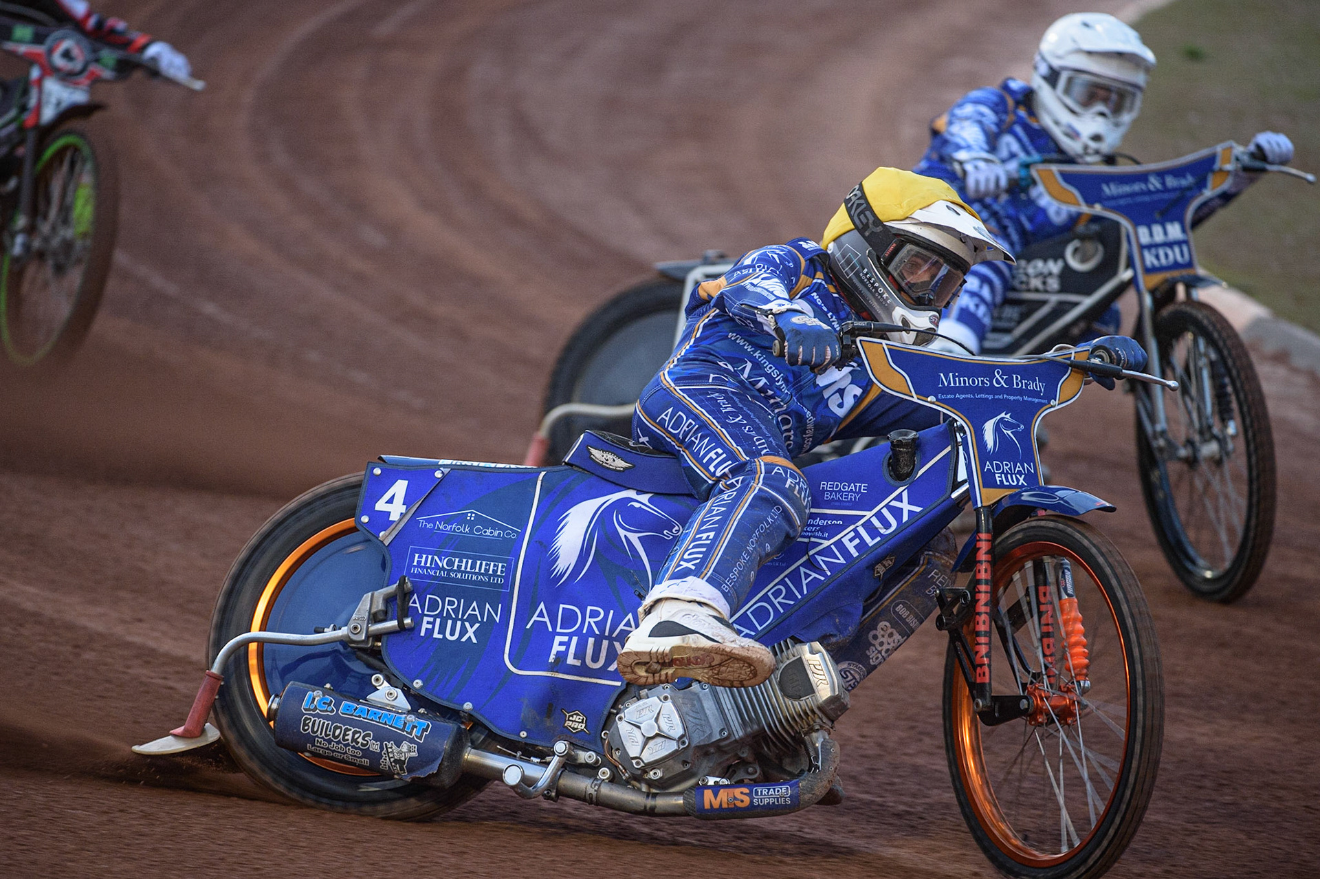 MANCHESTER, UK. AUGUST 23RD    Lewis Kerr   (Yellow) outside Erik Riss  (White) during the SGB Premiership match between Belle Vue Aces and King's Lynn Stars at the National Speedway Stadium, Manchester on Monday 23rd August 2021. (Credit: Ian Charles | MI News)