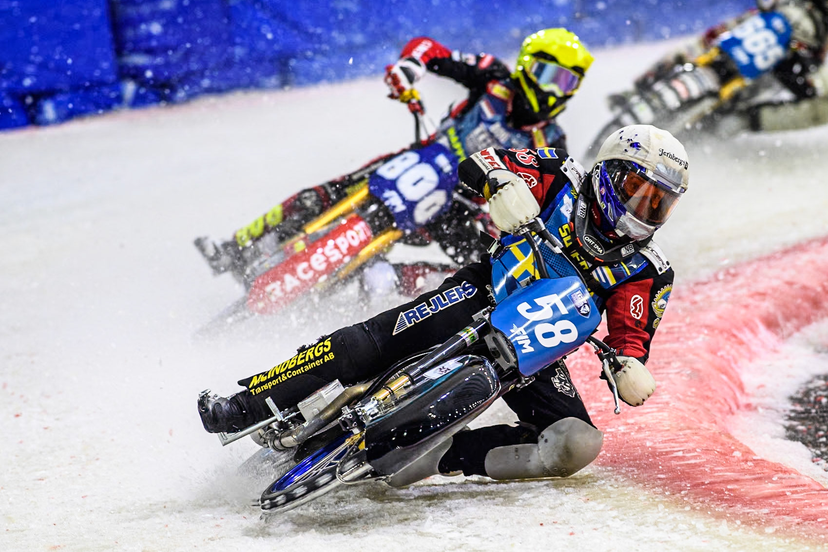 Sweden's Stefan Svensson (58) in White leading Netherlands' Jasper Iwema (800) in Yellow during the FIM Ice Speedway Gladiators World Championship Final 3 at Ice Rink Thialf, Heerenveen on Saturday 6th April 2024. (Photo: Ian Charles | MI News)