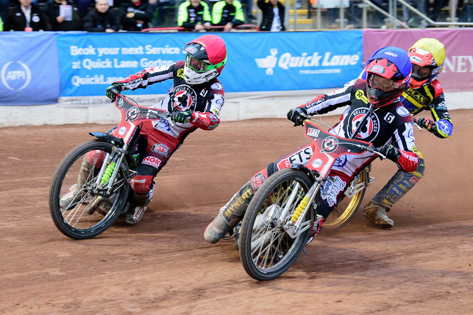 MANCHESTER, UK. JUL 5TH   Charles Wright  (Red) and Jye Etheridge  (Blue) lead Connor Mountain (Yellow) during the SGB Premiership match between Belle Vue Aces and Sheffield Tigers at the National Speedway Stadium, Manchester on Tuesday 5th July 2022. (Credit: Ian Charles | MI News)