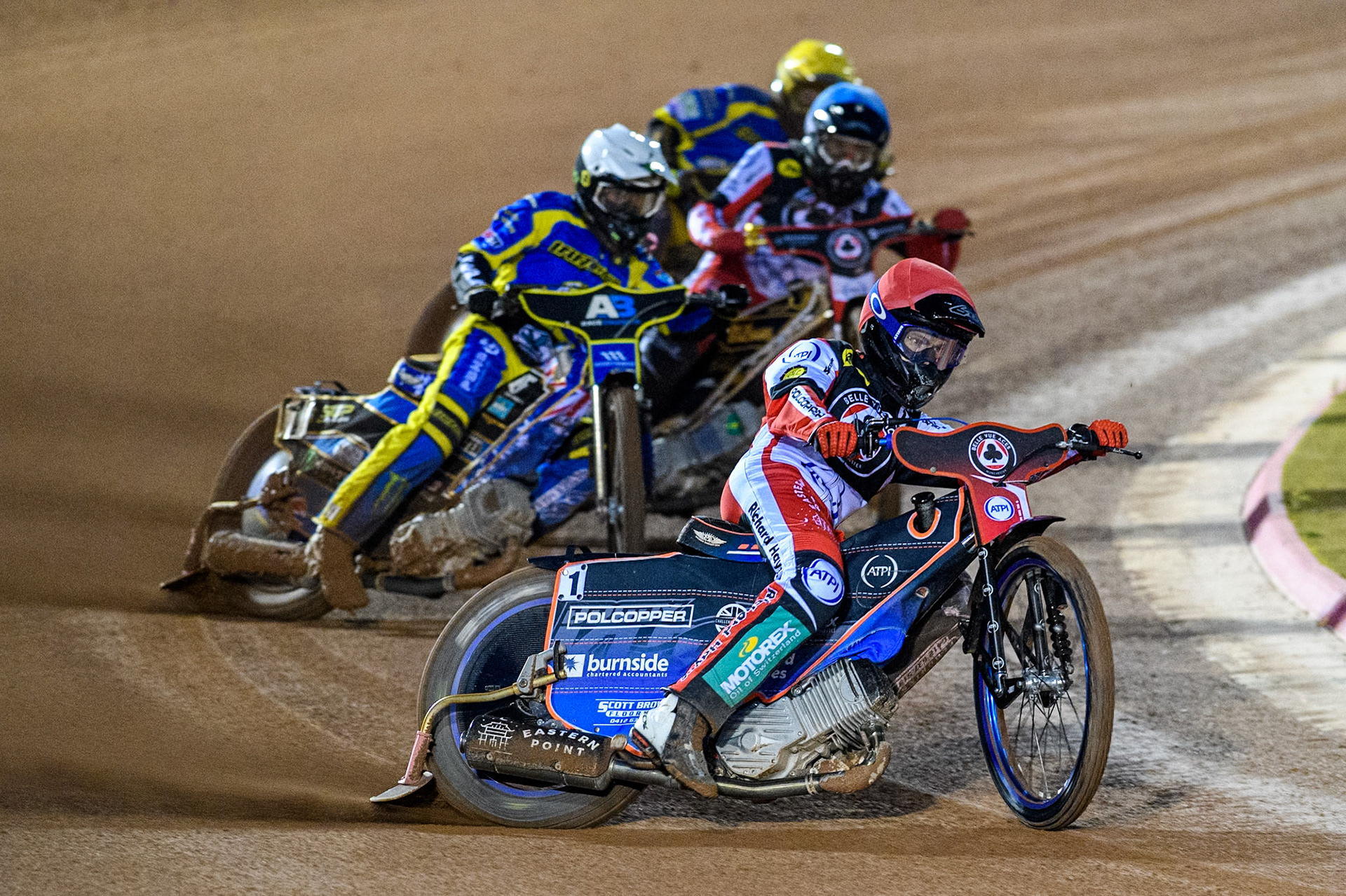 Belle Vue Aces' Brady Kurtz  in Red leading Sheffield Tigers' Jack Holder  in White, Belle Vue Aces' Norick Blodorn  in Blue and Sheffield Tigers' Kyle Howarth  in Yellow during the Rowe Motor Oil Premiership Play Off Semi Final 2, 1st Leg match between Belle Vue Aces and Sheffield Tigers at the National Speedway Stadium, Manchester on Monday 16th September 2024. (Photo: Ian Charles | MI News)