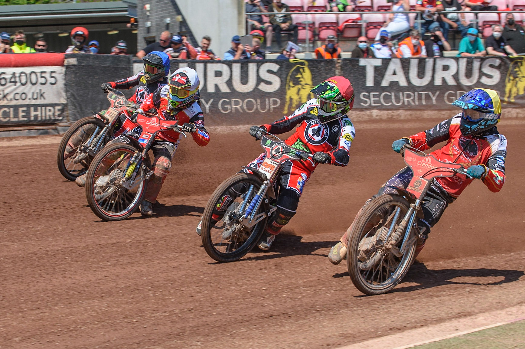 MANCHESTER, UK. MAY 31ST  Ulrich Ostergaard  (Yellow) inside Dan Bewley  (Red), Michael Palm Toft  (White) and Tom Brennan  (Blue) during the SGB Premiership match between Belle Vue Aces and Peterborough at the National Speedway Stadium, Manchester on Monday 31st May 2021. (Credit: Ian Charles | MI News)