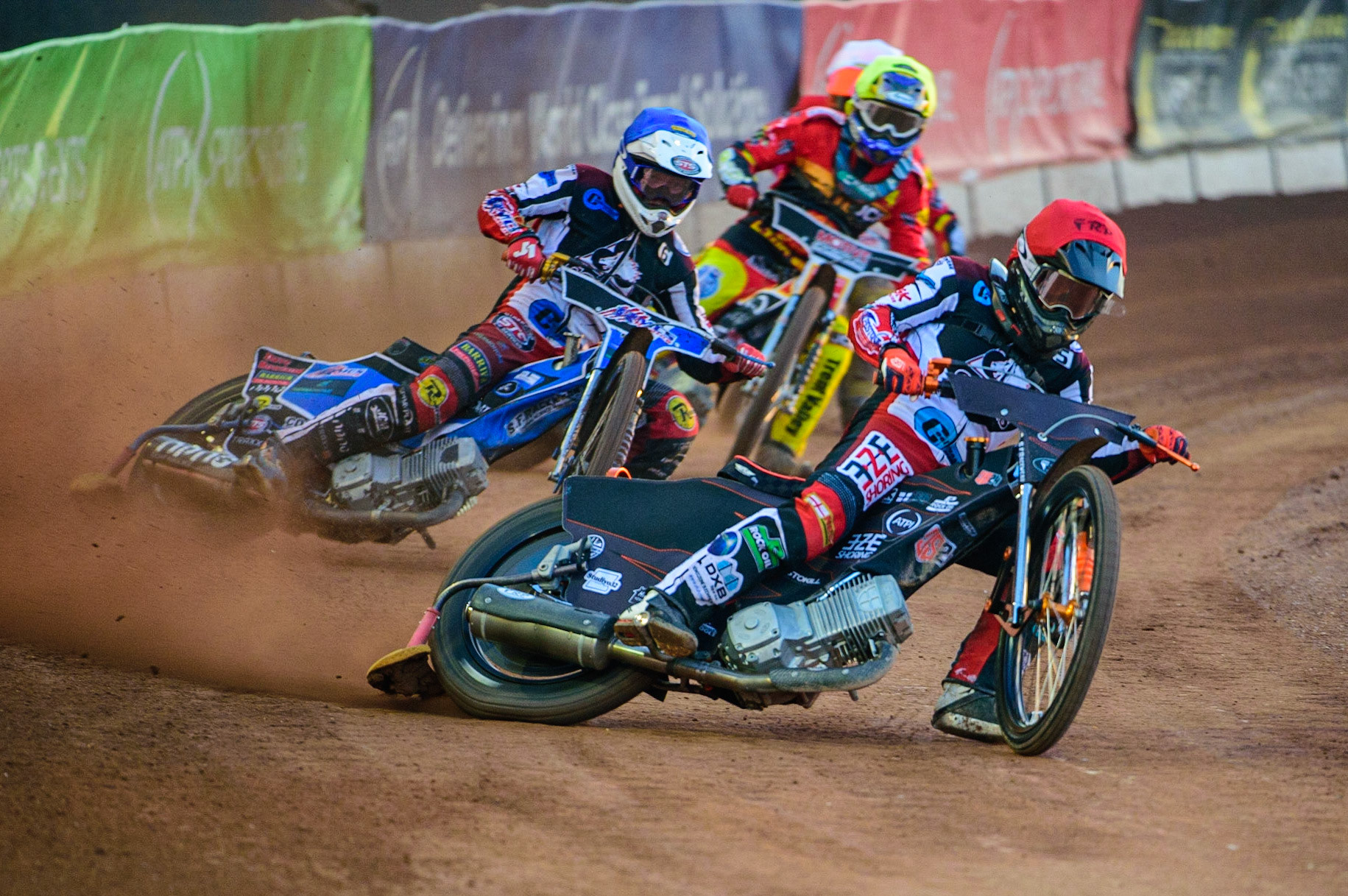 Jack Smith  (Red) leads Archie Freeman  (Blue) Tom Spencer  (Yellow) and Connor Coles  (White) during the National Development League match between Belle Vue Aces and Leicester Lions at the National Speedway Stadium, Manchester on Friday 19th August 2022. (Credit: Ian Charles | MI News)