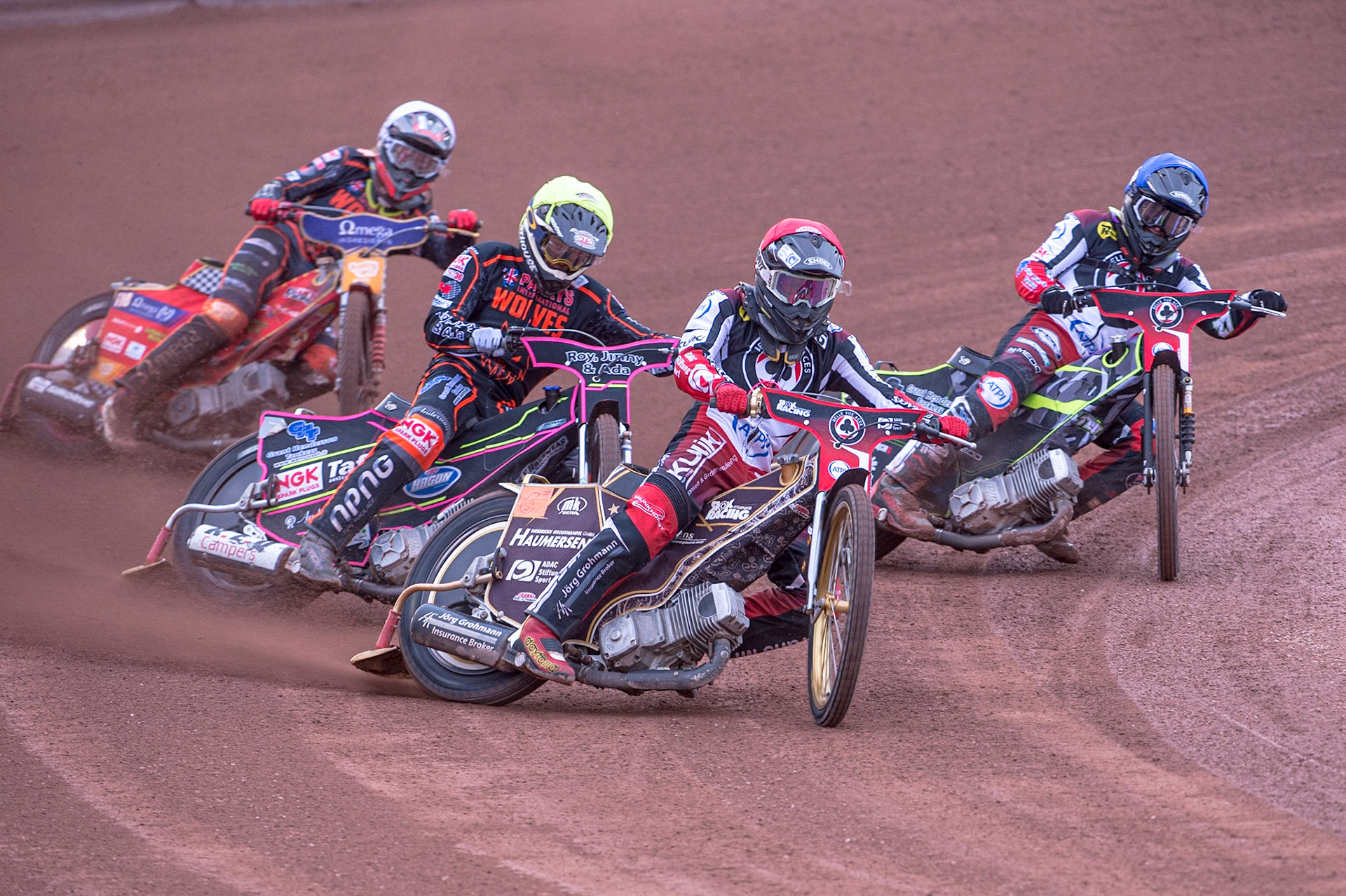 MANCHESTER, UK. JUN 13TH Norick Blödorn (Red) leads Leon Flint  (Yellow) Tom Brennan (Blue) and Drew Kemp  (White) during the SGB Premiership match between Belle Vue Aces and Wolverhampton  Wolves at the National Speedway Stadium, Manchester on Monday 13th June 2022. (Credit: Ian Charles | MI News)