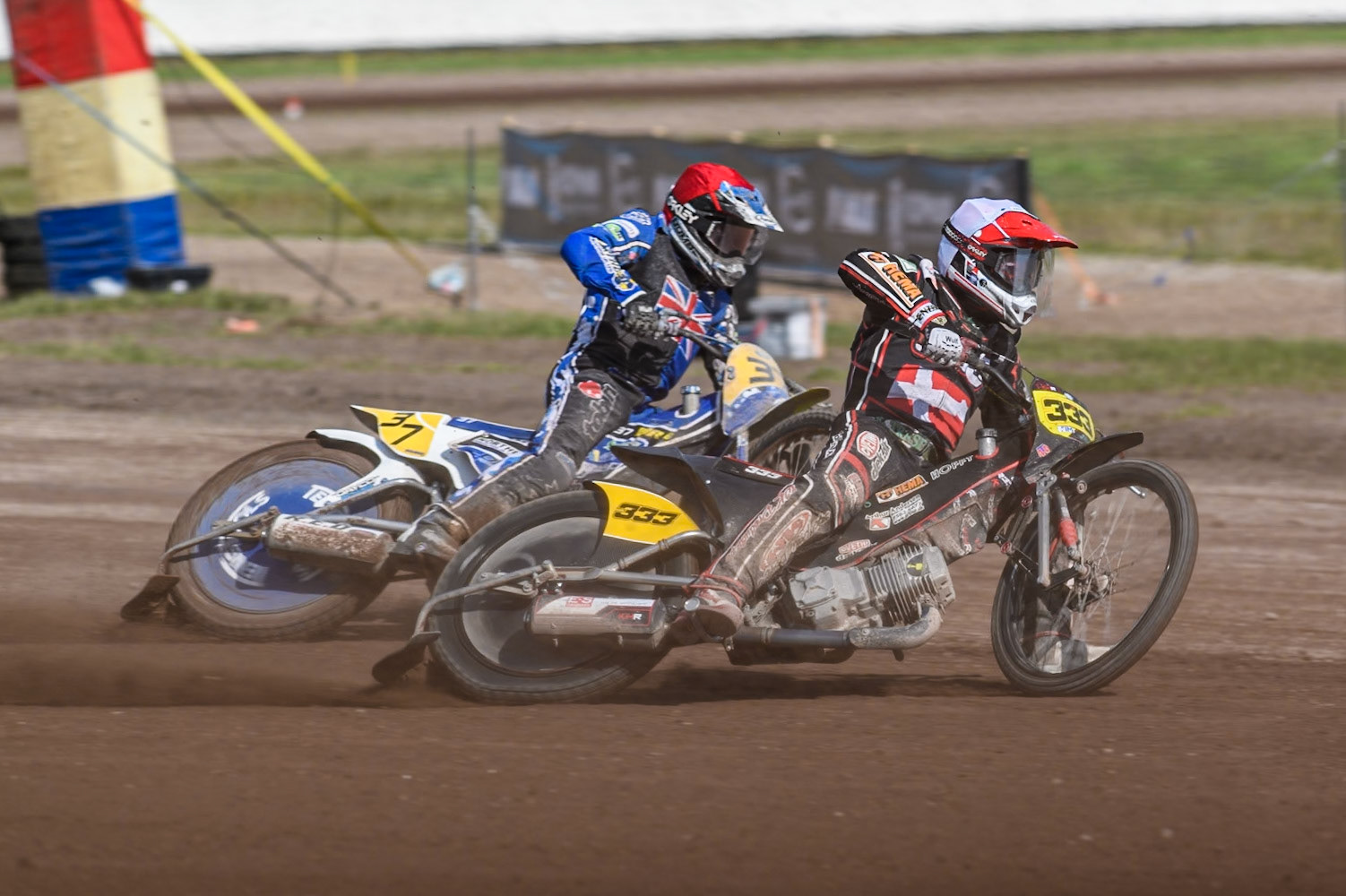 Kenneth Kruse Hansen (333) of Denmark in White leading Chris Harris (37)of Great Britain in Red during the FIM Long Track World Championship Final 5 at the Speed Centre Roden, Roden, Netherlands on Sunday 22nd September 2024. (Photo: Ian Charles | MI News)