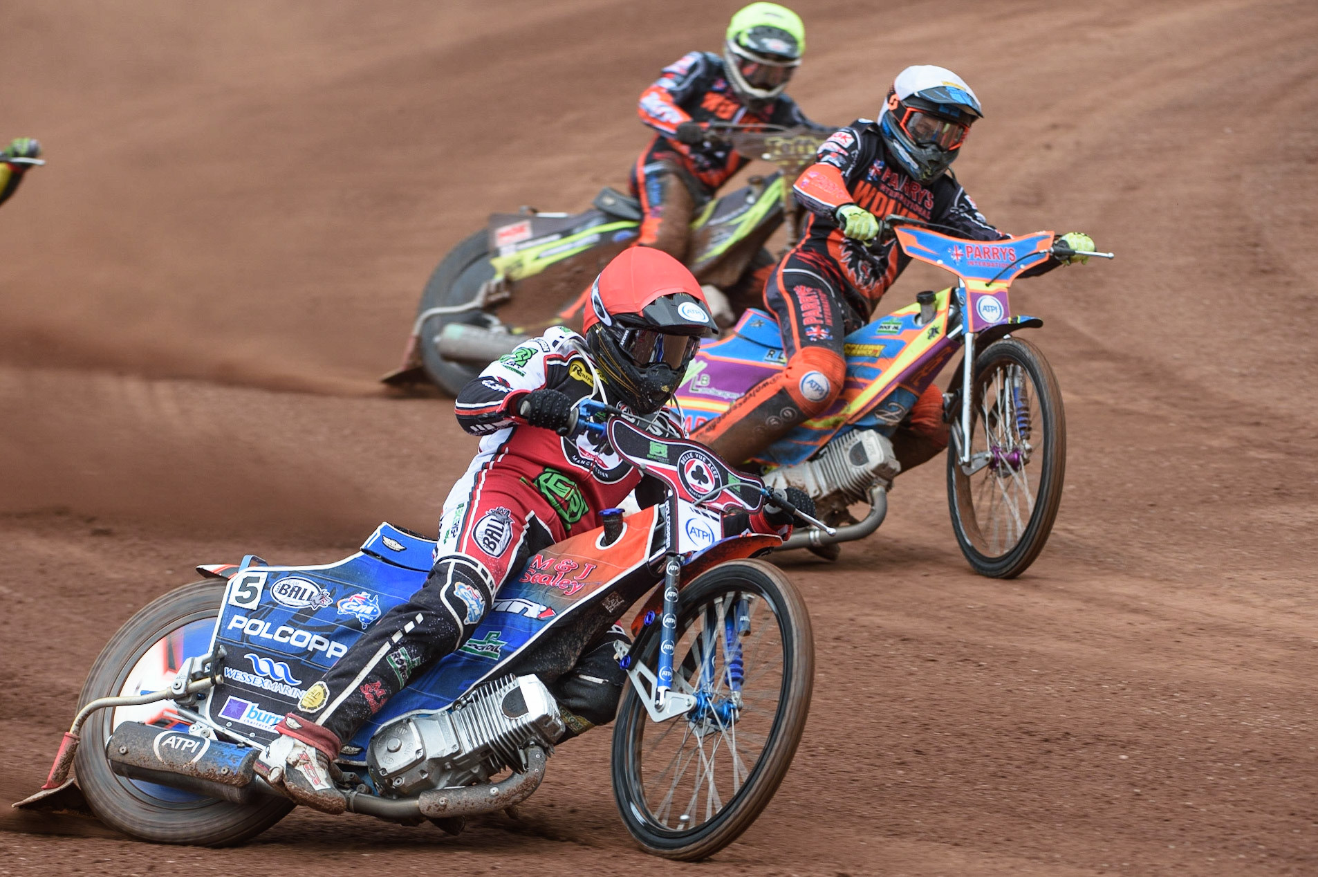 MANCHESTER, UK. AUGUST 30TH Brady Kurtz  (Red) outside Rory Schlein (White) and Leon Flint (Yellow) during the SGB Premiership match between Belle Vue Aces and Wolverhampton Wolves at the National Speedway Stadium, Manchester on Monday 30th August 2021. (Credit: Ian Charles | MI News)