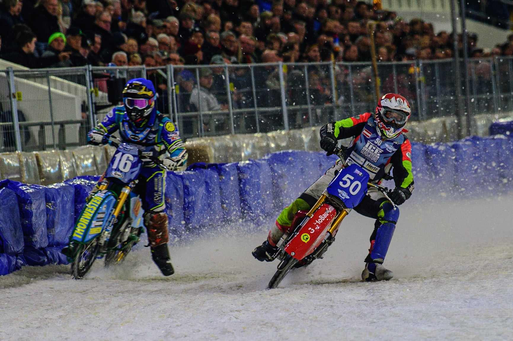 HEERENVEEN, NL. 16\ (Blue)Harald Simon (50) (Red) passes \  during the FIM Ice Speedway Gladiators World Championship Final 4 at Ice Rink Thialf, Heerenveen on Sunday  3 April 2022. (Credit: Ian Charles | MI News)