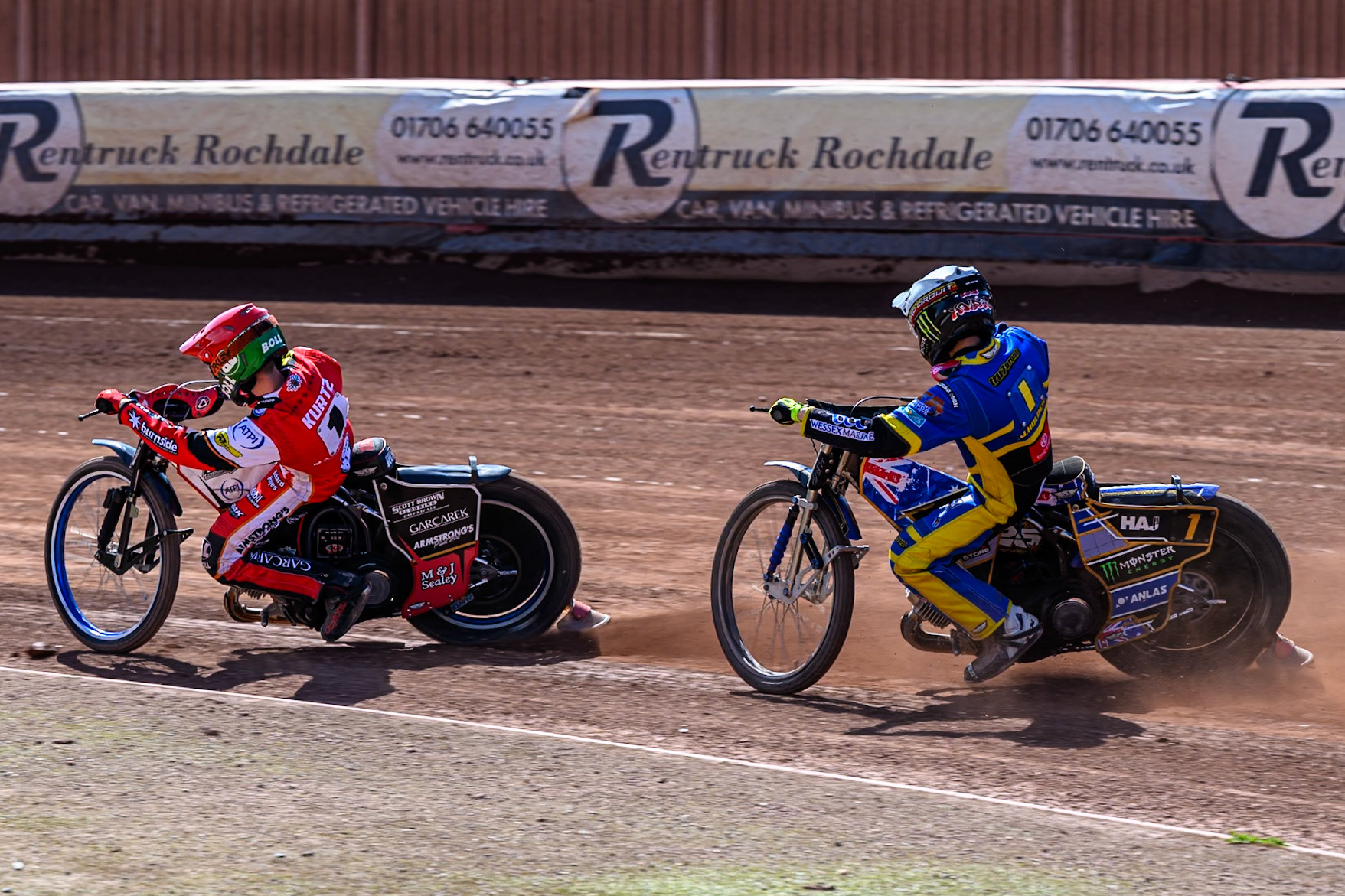 Jack Holder of Sheffield Tigers  in White chases Brady Kurtz of Belle Vue Aces  in Red during the Rowe Motor Oil Premiership match between Belle Vue Aces and Sheffield Tigers at the National Speedway Stadium, Manchester on Monday 25th August 2025. (Photo: Ian Charles | MI News)