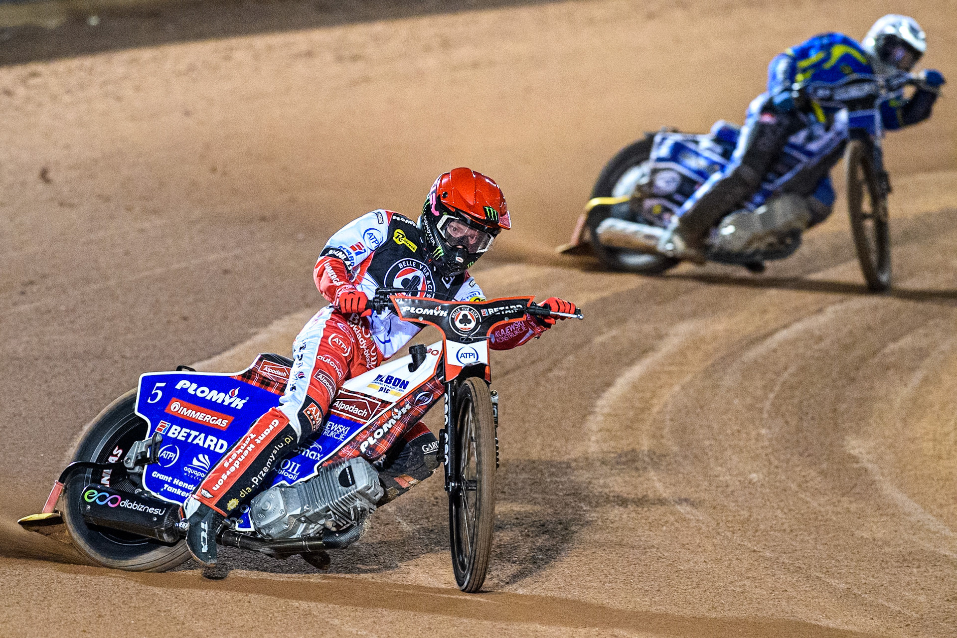 Belle Vue Aces' Dan Bewley  in Red leading Sheffield Tigers' Guest Rider Chris Harris  in White during the Rowe Motor Oil Premiership Play Off Semi Final 2, 1st Leg match between Belle Vue Aces and Sheffield Tigers at the National Speedway Stadium, Manchester on Monday 16th September 2024. (Photo: Ian Charles | MI News)