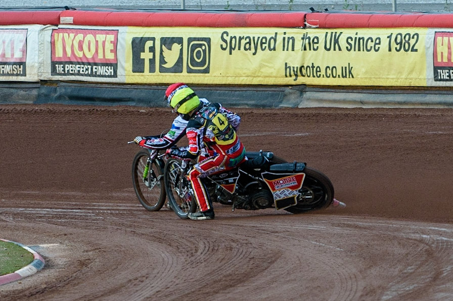 MANCHESTER, UK. JULY 29TH  Jack Parkinson-Blackburn (Red) passes Tom Spencer   (Yellow)  during the National Development League match between Belle Vue Colts and Leicester Lion Cubs at the National Speedway Stadium, Manchester on Thursday 29th July 2021. (Credit: Ian Charles | MI News)