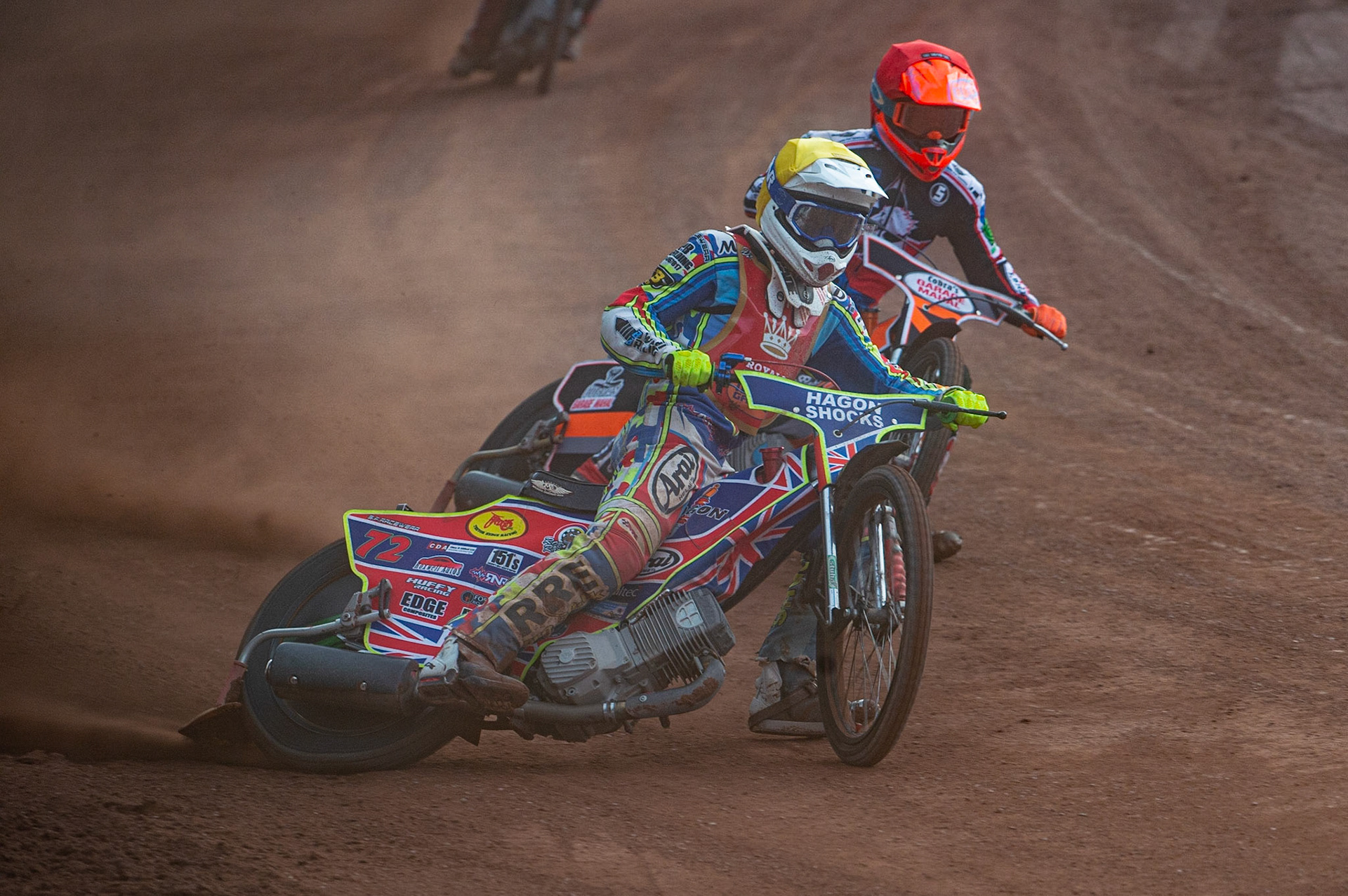 MANCHESTER, UK. JULY 2ND  Jake Mulford  (Yellow) passes Connor Coles  (Red) during the National Development League match between Belle Vue Colts and Kent Royals at the National Speedway Stadium, Manchester on Friday 2nd July 2021. (Credit: Ian Charles | MI News)