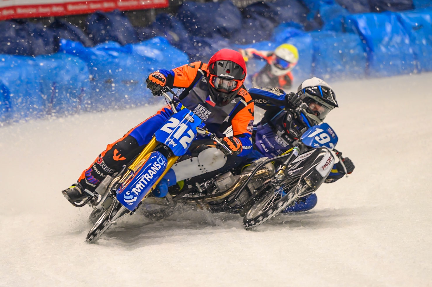 Niclas Svensson (192) of Sweden  in White shoves Lukas Hutla (212) of Czechia in Red out to pass him with Johann Weber (33) of Germany  in Blue on the outside during the Ice Speedway Gladiators World Championship Final 1 at Max-Aicher-Arena, Inzell on Saturday 14th March 2026. (Photo: Ian Charles | MI News)