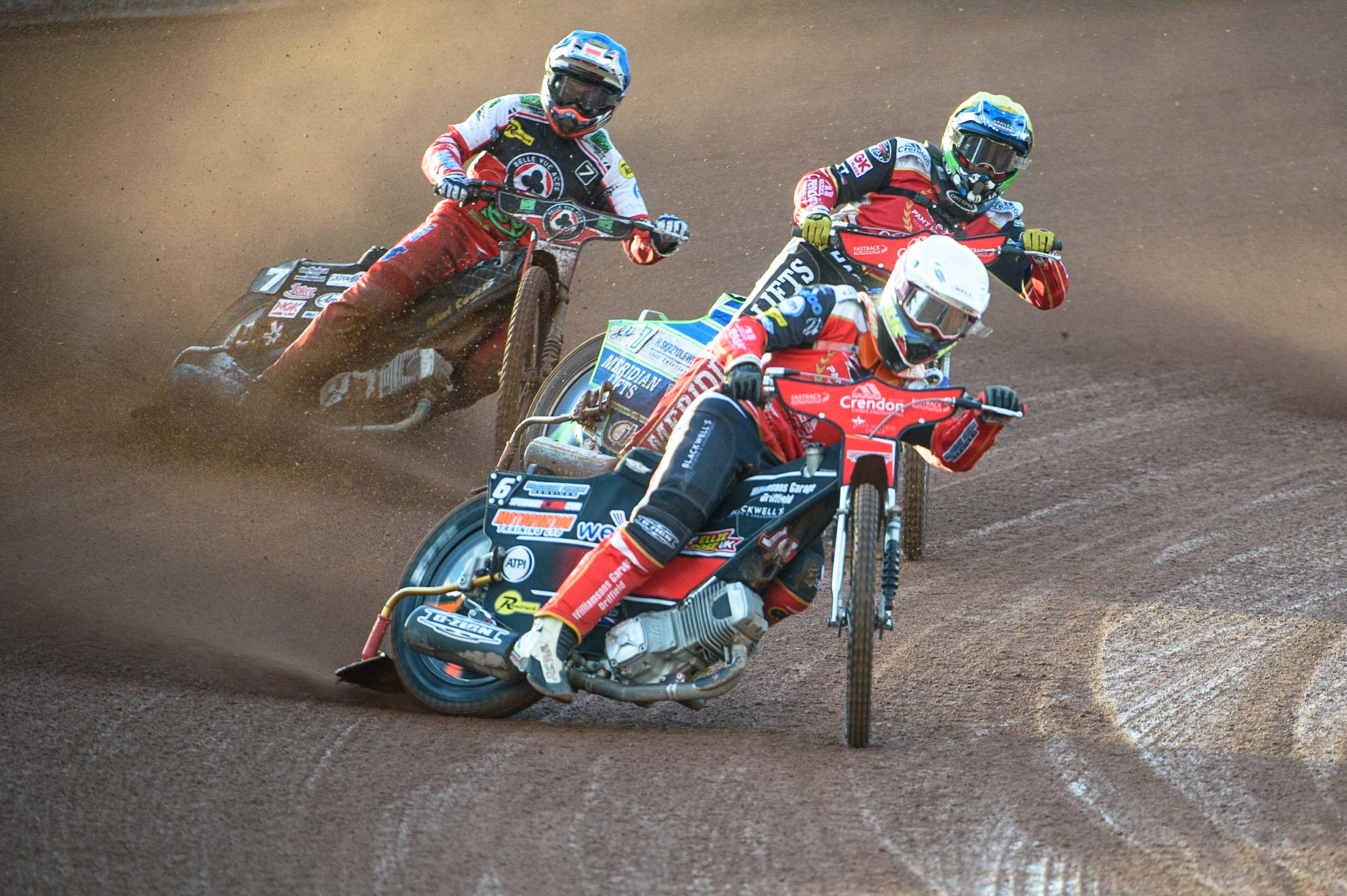 MANCHESTER, UK. AUG 9TH Jordan Palin  (White) and Hans Andersen  (Yellow) lead Ricky Wells  (Blue)  during the SGB Premiership match between Belle Vue Aces and Peterborough at the National Speedway Stadium, Manchester on Monday 9th August 2021. (Credit: Ian Charles | MI News)