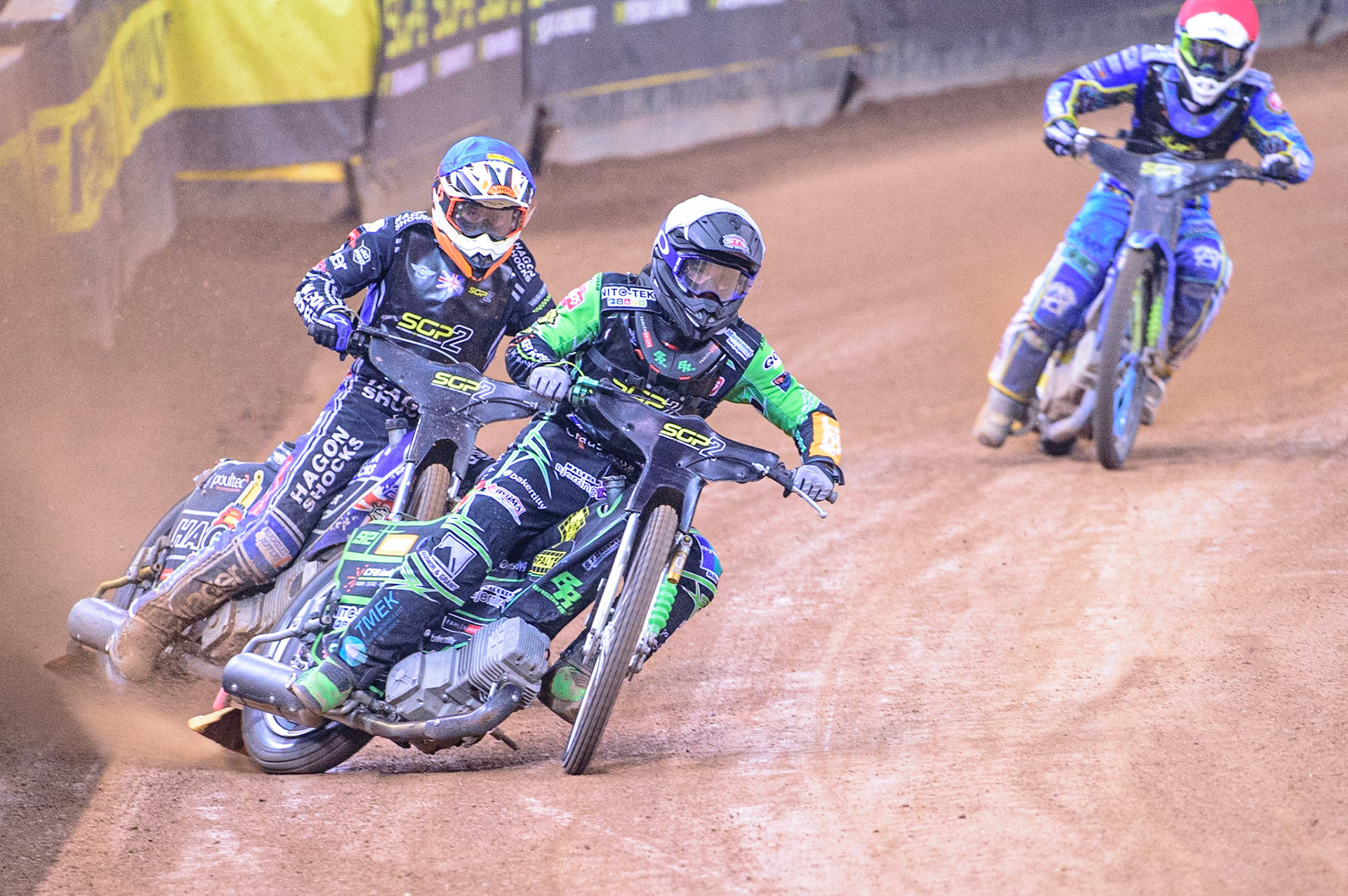 Benjamin Basso (Denmark)  leads Jason Edwards (Great Britain) with Petr Chlupac (Czech Republic) (Red) behind during the FIM  Speedway Grand Prix  2 of Great Britain at the Principality Stadium, Cardiff on Sunday 14th August 2022. (Credit: Ian Charles | MI News)