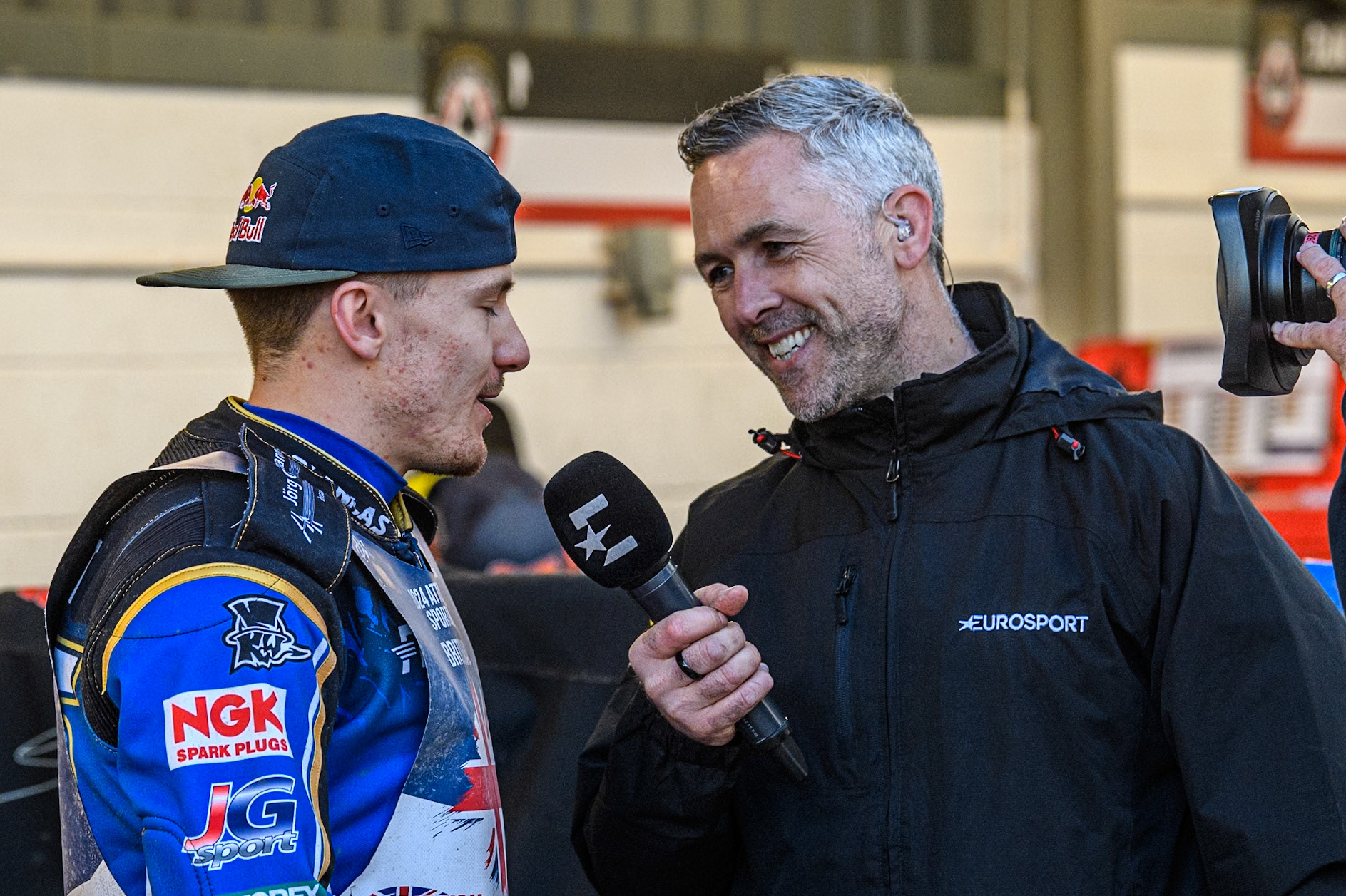Robert Lambert (Left) chats with Scott Nicholls from Eurosport during the Attis Insurance Sports Division British Speedway Championship Final at the National Speedway Stadium, Manchester on Saturday 8th June 2024. (Photo: Ian Charles | MI News)