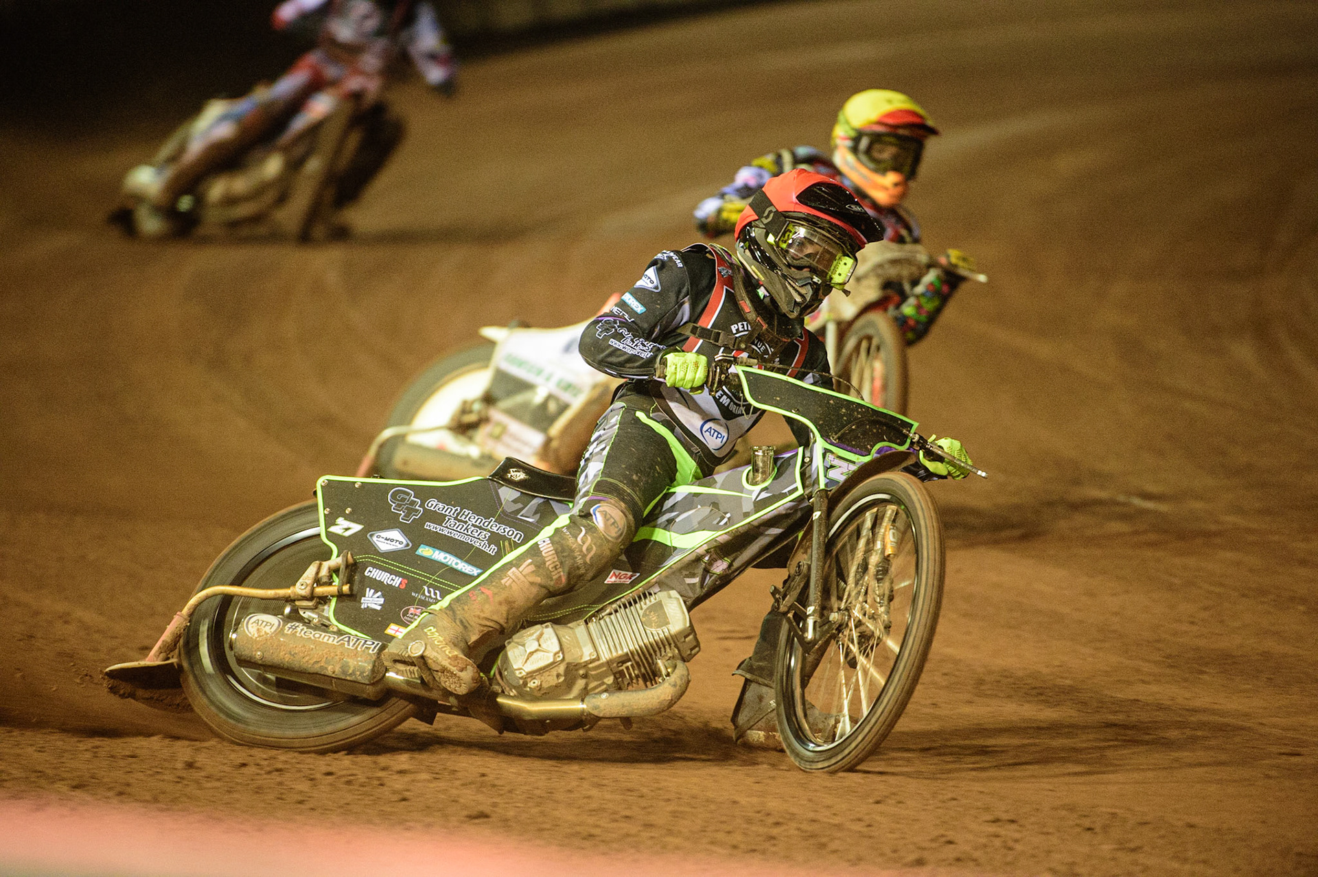 MANCHESTER, UK. MAR 21ST. Tom Brennan (Red) leads Niels-Kristian Iversen (Yellow) during the ATPI Peter Craven Memorial Trophy at the National Speedway Stadium, Manchester on Monday 21st March 2022. (Credit: Ian Charles | MI News)