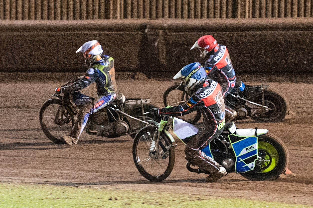Photo: Ian Charles

Ben Rathbone  (Blue) and Danny Phillips  (Red) chase Henry Atkins  (White)

Belle Vue Colts v Mildenhall Fen Tigers, National League, Belle Vue National Speedway Stadium, Manchester, Monday 2  September  2019