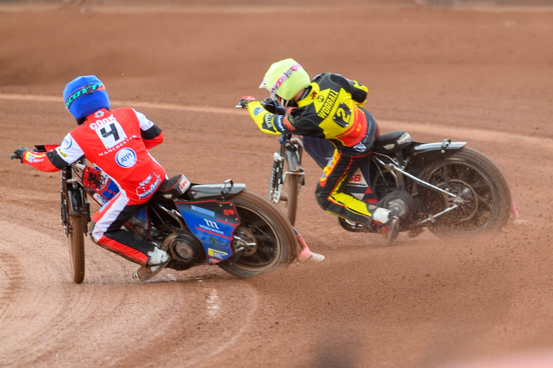 Belle Vue Aces' Ben Cook in Blue passes Birmingham Brummies' Steve Worrall  in Yellow during the Rowe Motor Oil Premiership match between Belle Vue Aces and Birmingham Brummies at the National Speedway Stadium, Manchester on Monday 6th May 2024. (Photo: Ian Charles | MI News)