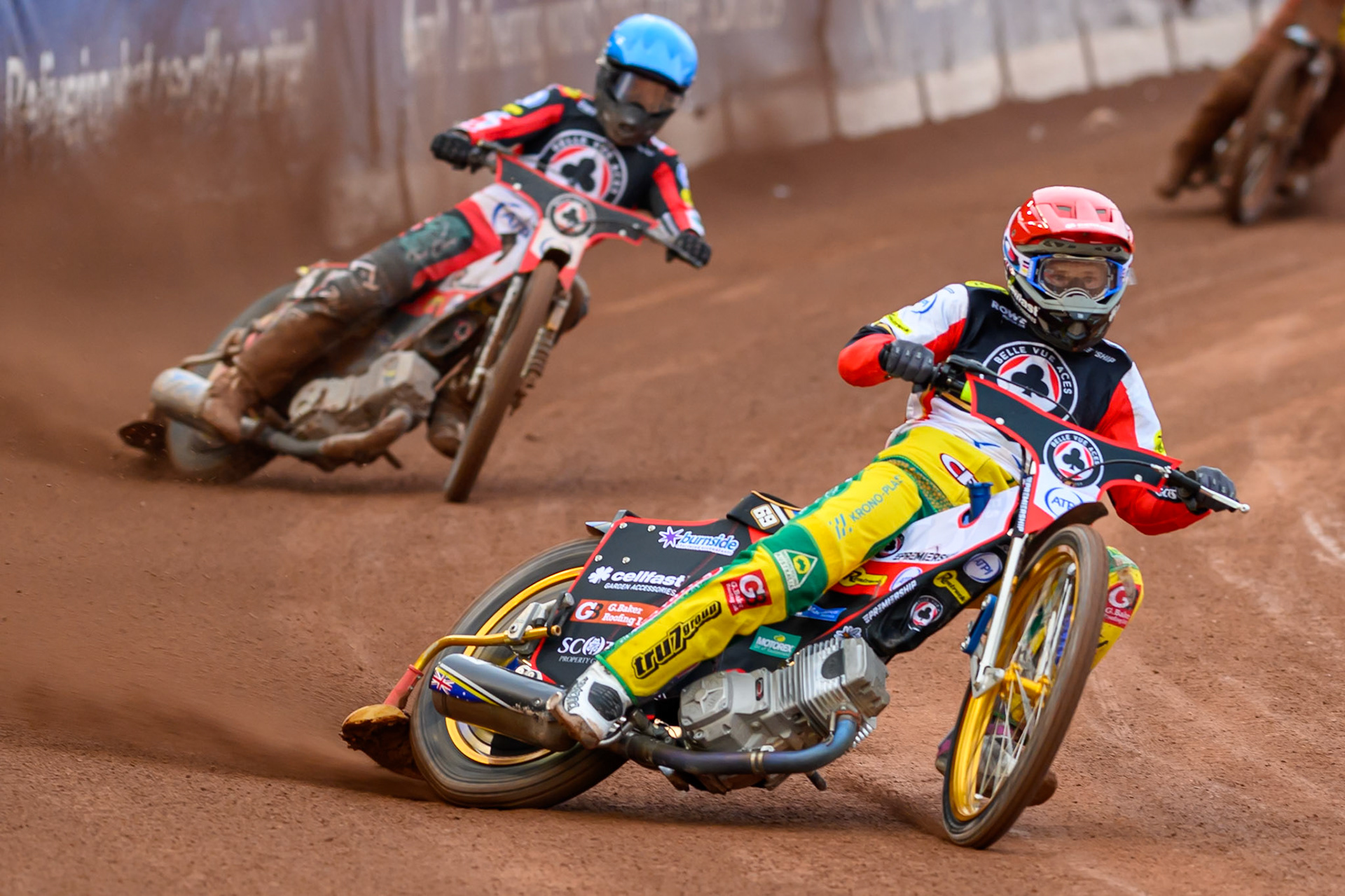Jason Doyle of Belle Vue Aces in Red leading Tate Zischke of Belle Vue Aces in Blue during the Rowe Motor Oil Premiership match between Belle Vue Aces and Leicester Lions at the National Speedway Stadium, Manchester on Monday 15th June 2026. (Photo: Ian Charles | MI News)