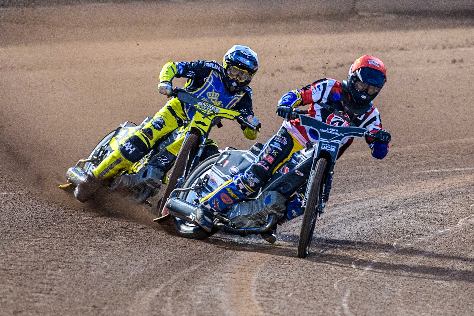 Belle Vue Colts' Guest Rider Joe Thompson in Red leading Edinburgh Monarchs' Dayle Wood in White during the WSRA National Development League match between Belle Vue Aces and Edinburgh Monarchs at the National Speedway Stadium, Manchester on Friday 30th August 2024. (Photo: Ian Charles | MI News)