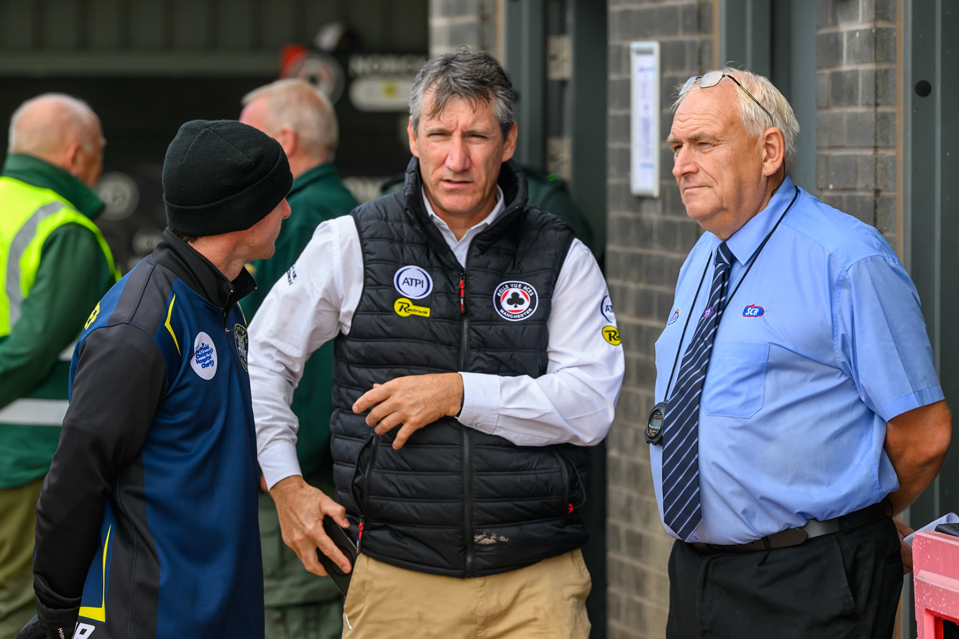 (L to R)  Sheffield Tigers Captain Josh Pickering, Mark Lemon, Team Manager of Belle Vue Aces  and Referee Chris Durno discuss the situation before the meeting is called off  during the Rowe Motor Oil Premiership match between Belle Vue Aces and Sheffield Tigers at the National Speedway Stadium, Manchester on Monday 31st August 2026. (Photo: Ian Charles | MI News)