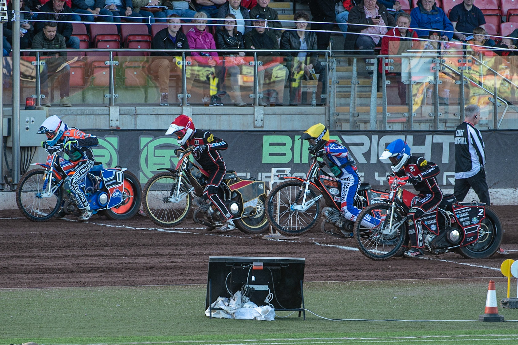 Photo by Ian Charles

(l-r) Brady Kurtz  (White), Max Fricke  (Red), Luke Becker  (Yellow) and Jaimon Lidsey  (Blue) leave the start

Belle Vue Aces v Poole Pirates, British Speedway Premiership, Belle Vue National Speedway Stadium, Manchester, Monday 1  July  2019