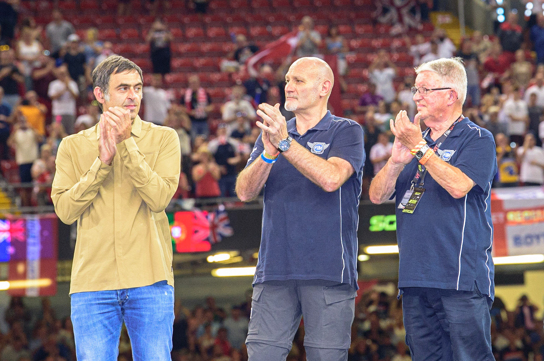 The presenting party: (l - r) Ronnie O’Sullivan (World Snooker Championship), Armando Castagna (Head of FIM Track Commission), Graham Brodie (ACU) during the FIM  Speedway Grand Prix of Great Britain at the Principality Stadium, Cardiff on Saturday 13th August 2022. (Credit: Ian Charles | MI News