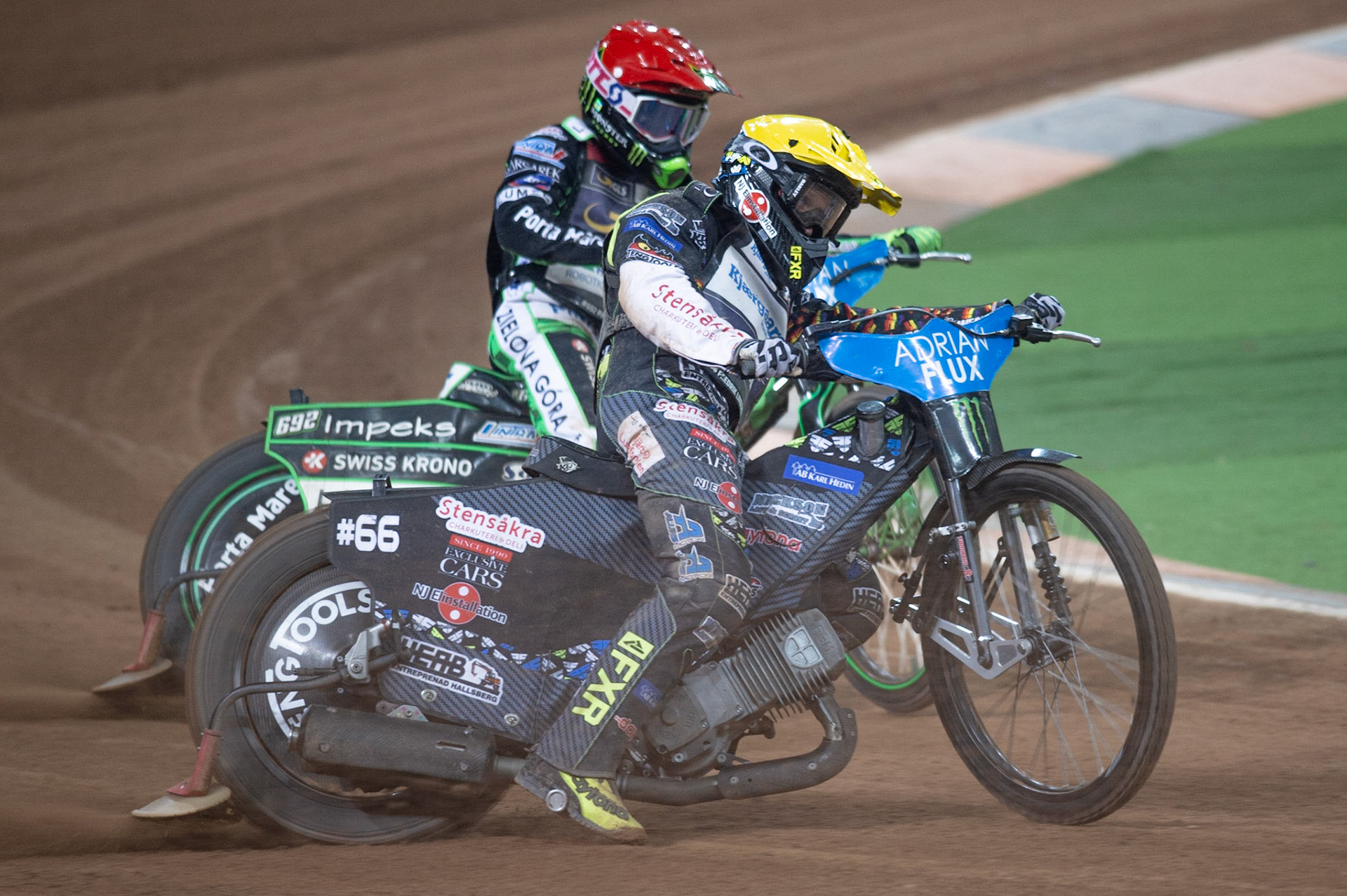 CARDIFF,WALES  Fredrik Lindgren (Yellow) passes Patryk Dudek (Red) during the ADRIAN FLUX BRITISH FIM SPEEDWAY GRAND PRIX at the Principality Stadium, Cardiff on Saturday 21st September 2019. (Credit: Ian Charles | MI News)