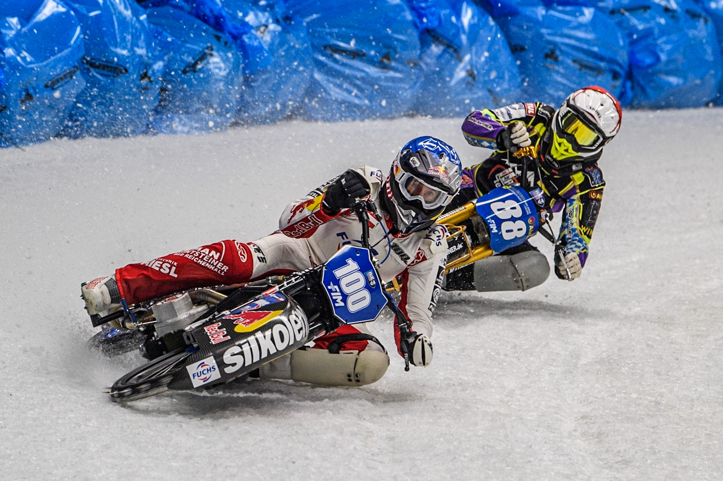 Franky Zorn (100) of Austria in Blue leading Max Niedermaier  (88) of Germany in Red during the Ice Speedway Gladiators World Championship Final 1 at Max-Aicher-Arena, Inzell on Saturday 15th March 2025. (Photo: Ian Charles | MI News)