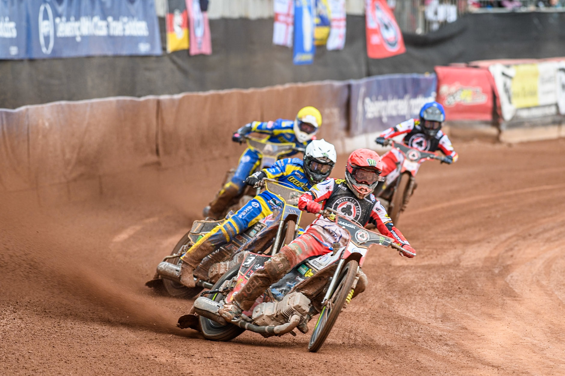 Jaimon Lidsey of Belle Vue Aces in Red leading Jack Holder of Sheffield Tigers in White Anders Rowe of Sheffield Tigers in Yellow and Zach Cook of Belle Vue Aces in Blue during the Rowe Motor Oil Premiership match between Belle Vue Aces and Sheffield Tigers at the National Speedway Stadium, Manchester on Monday 5th May 2025. (Photo: Ian Charles | MI News)