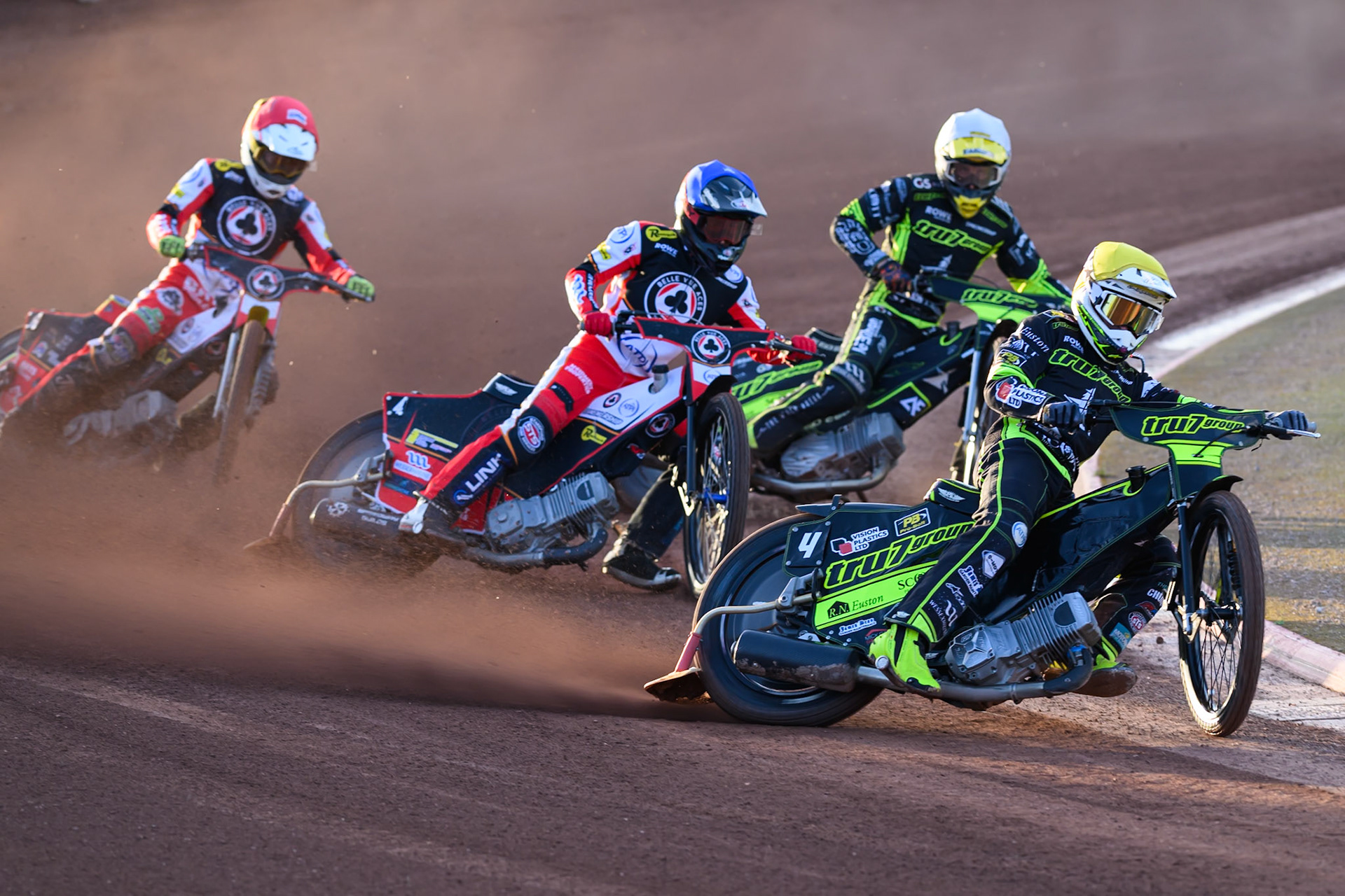 Tom Brennan of Ipswich Witches  in Yellow leading Zach Cook of Belle Vue Aces  in Blue, Adam Ellis of Ipswich Witches  in White and Tate Zischke of Belle Vue Aces  in Redduring the Rowe Motor Oil Premiership match between Belle Vue Aces and Ipswich Witches at the National Speedway Stadium, Manchester on Monday 4th August 2025. (Photo: Ian Charles | MI News)