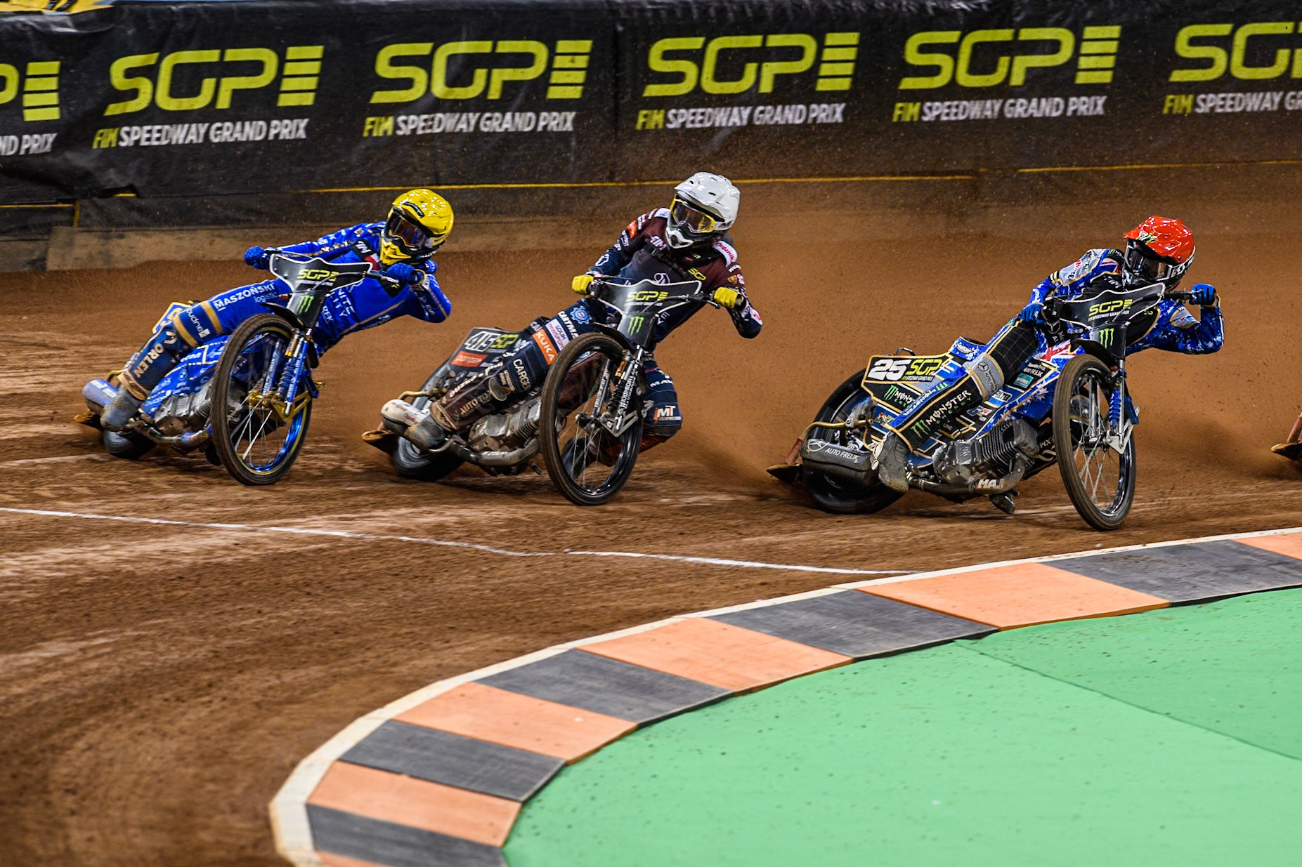 Bartosz Zmarzlik (95) of Poland  in Yellow rides outside Dominik Kubera (415) of Poland in White and Jack Holder (25) of Australia in Red during the FIM Speedway Grand Prix of Great Britain at The Principality Stadium, Cardiff on Saturday 17th August 2024. (Photo: Ian Charles | MI News)