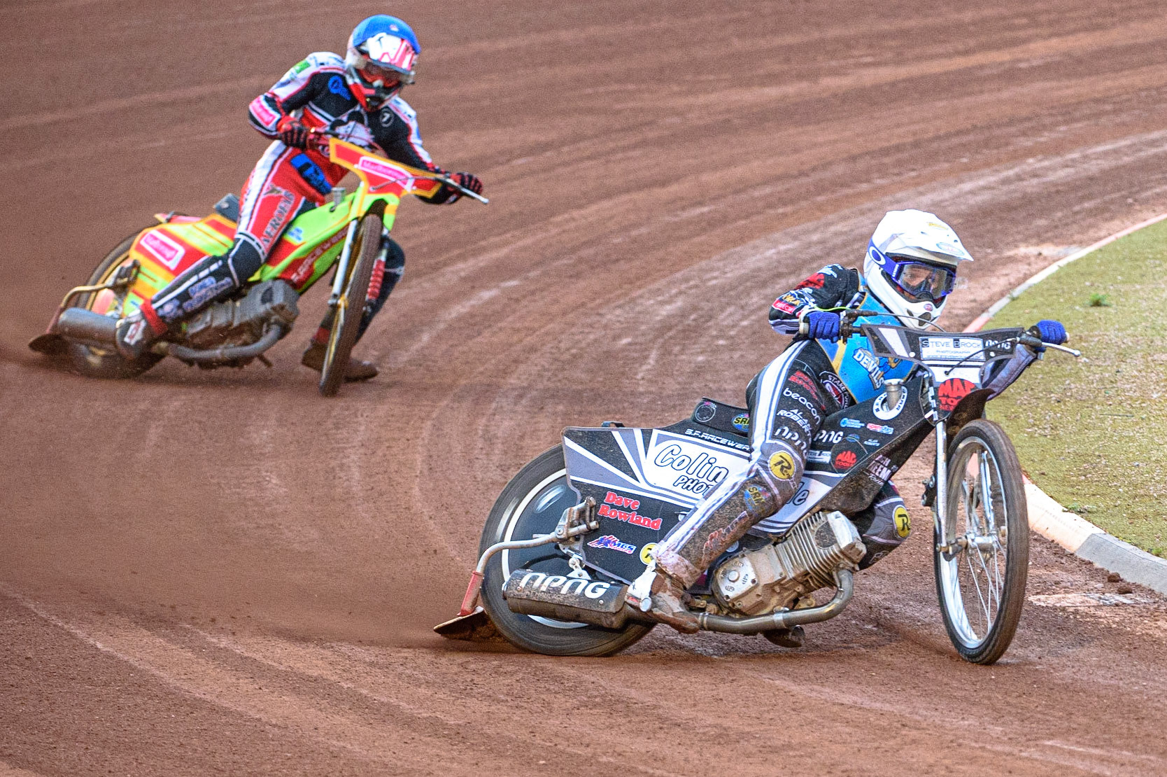 MANCHESTER, UK. AUGUST 20TH  Archie Freeman  (White) leads Ben Woodhull  (Blue)during the National Development League match between Belle Vue Aces and Armadale Devils at the National Speedway Stadium, Manchester on Friday 20th August 2021. (Credit: Ian Charles | MI News)