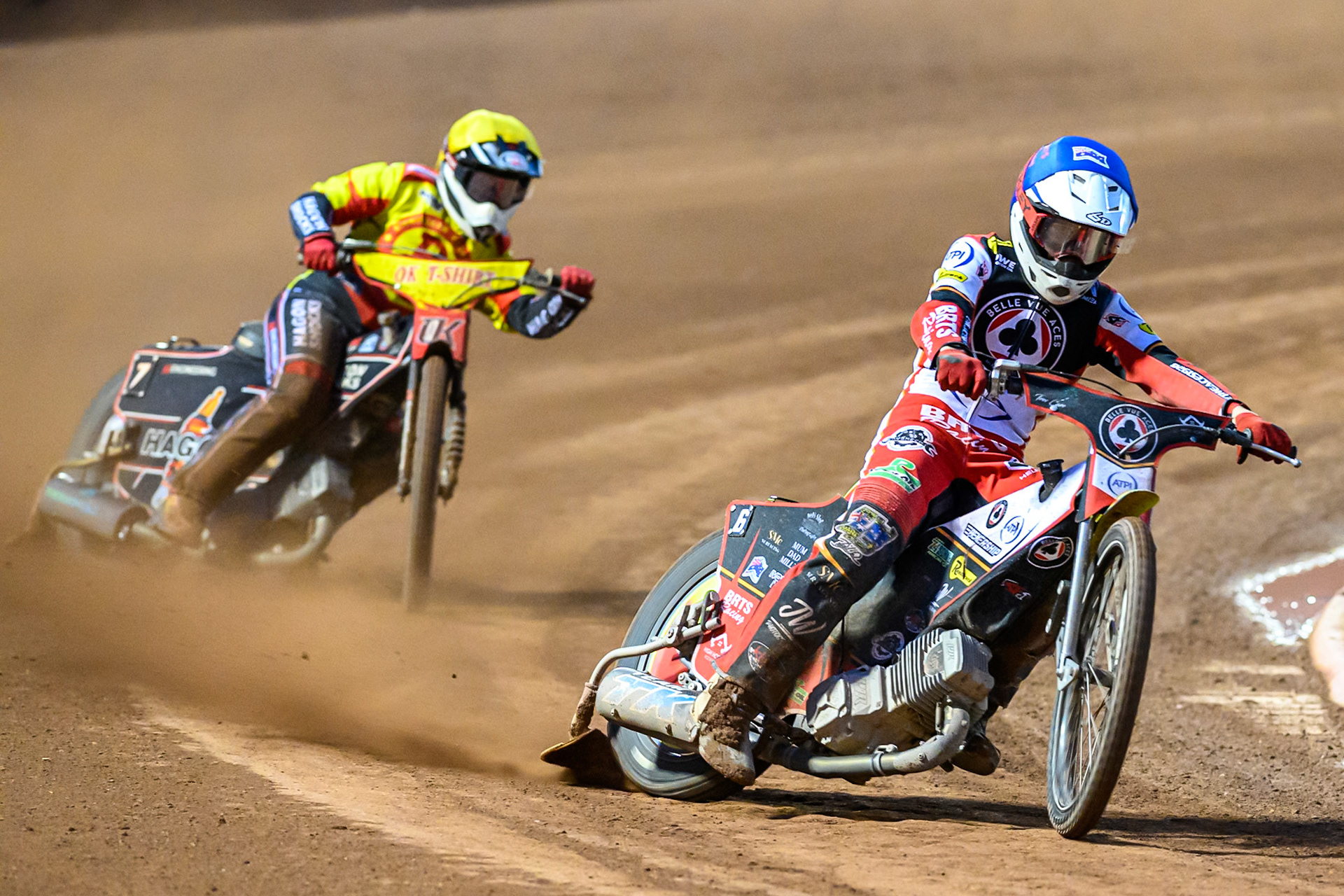 Tate Zischke of Belle Vue Aces  in Blue leading Sam Hagon of Birmingham Brummies  in Yellow during the Rowe Motor Oil Premiership match between Belle Vue Aces and Birmingham Brummies at the National Speedway Stadium, Manchester on Monday 18th August 2025. (Photo: Ian Charles | MI News)